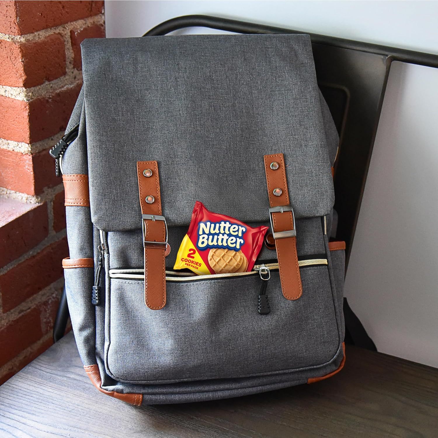 Shows the backpack in a real-world setting to help shoppers visualize the product in everyday use and understand its practical size and appearance.