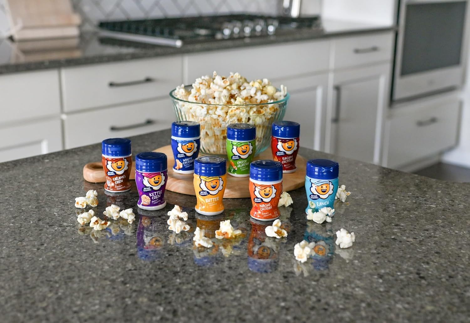 Displays the brand's full range of popcorn seasoning flavors to help shoppers understand the variety available and choose their preferred option.