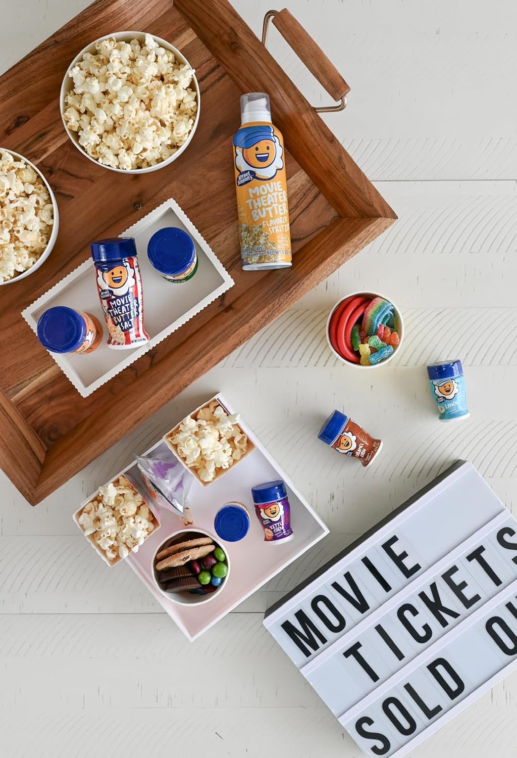 Demonstrates the product's use in a movie night or entertainment setting, showing it as the perfect companion for home theater snacking and family gatherings. Creates authenticity and relatability…