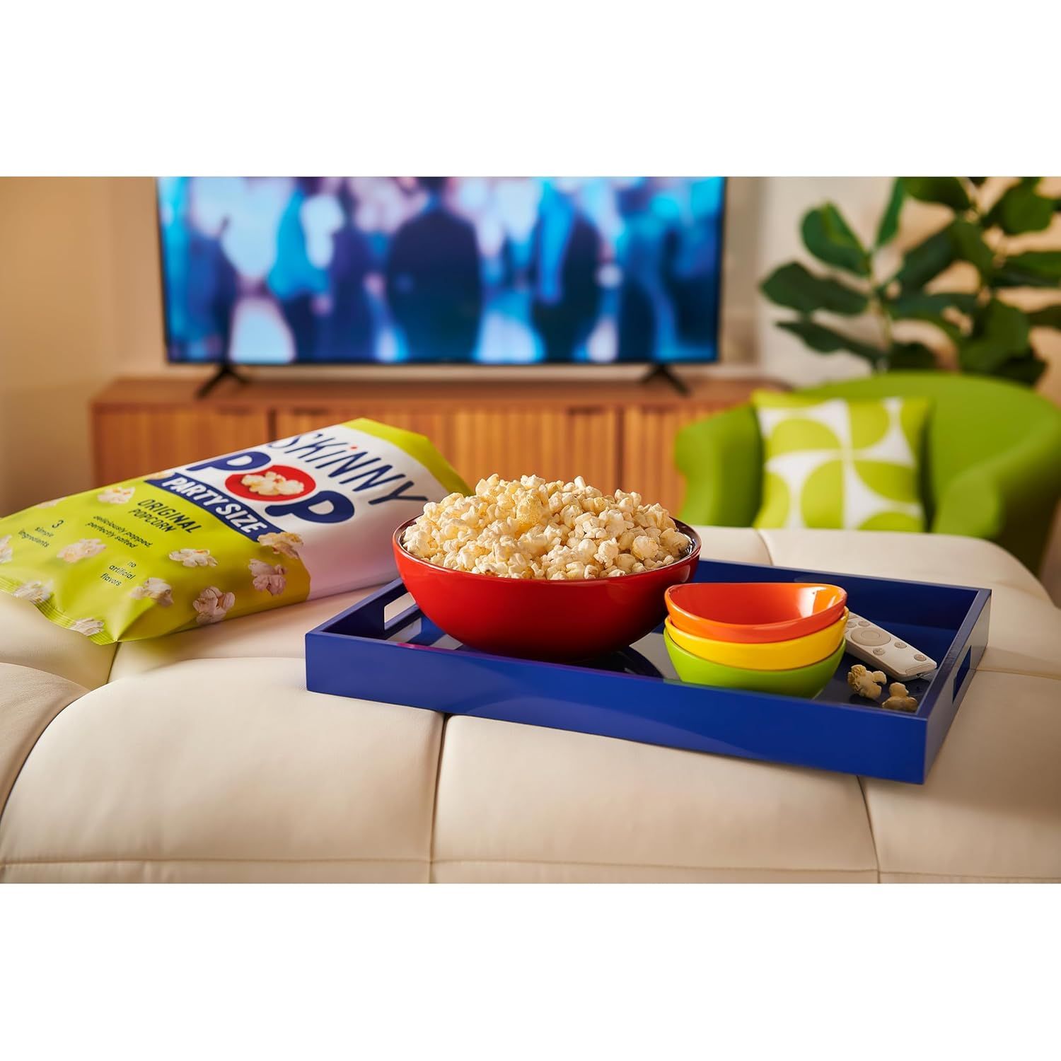 Demonstrates the product in a real-world living room context during movie or TV time, helping shoppers visualize how the product fits into their everyday lifestyle and entertainment routines.