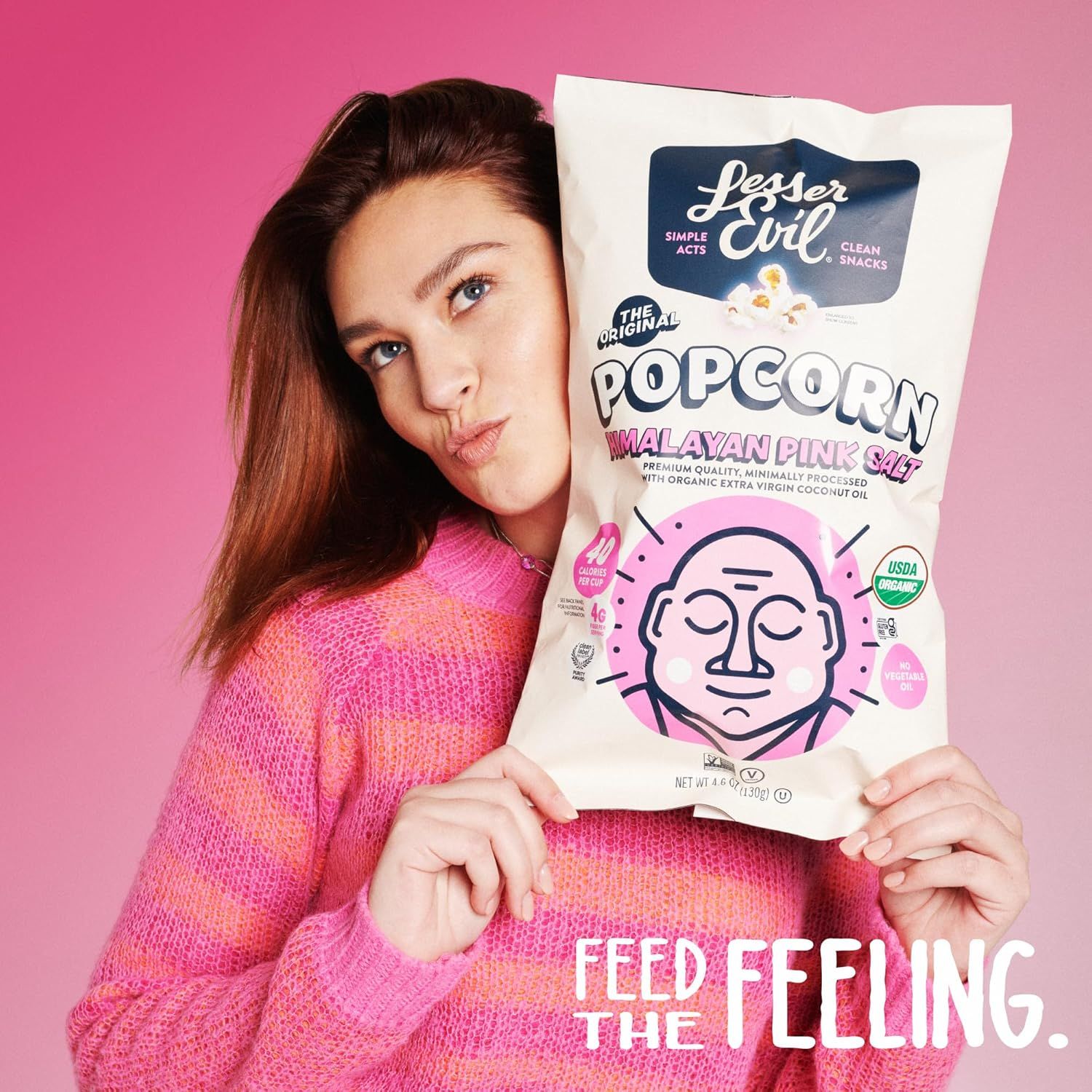 Creates an emotional connection by showing a real person enjoying the product in a relatable, feel-good moment, reinforcing the brand's message to 'Feed the Feeling.'