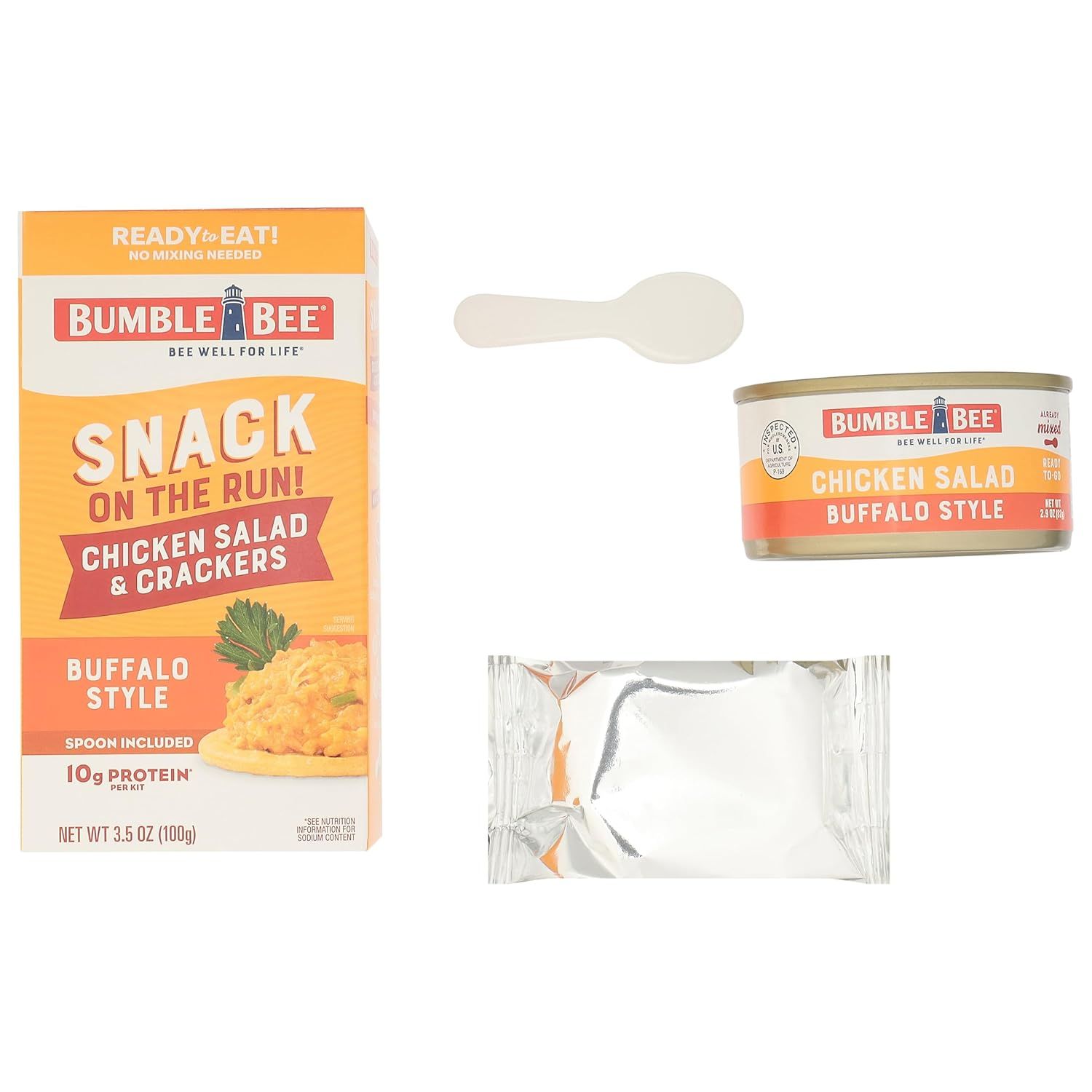 Shows everything included in the snack kit—the chicken salad container, crackers, and spoon—to help shoppers understand the complete package they will receive.