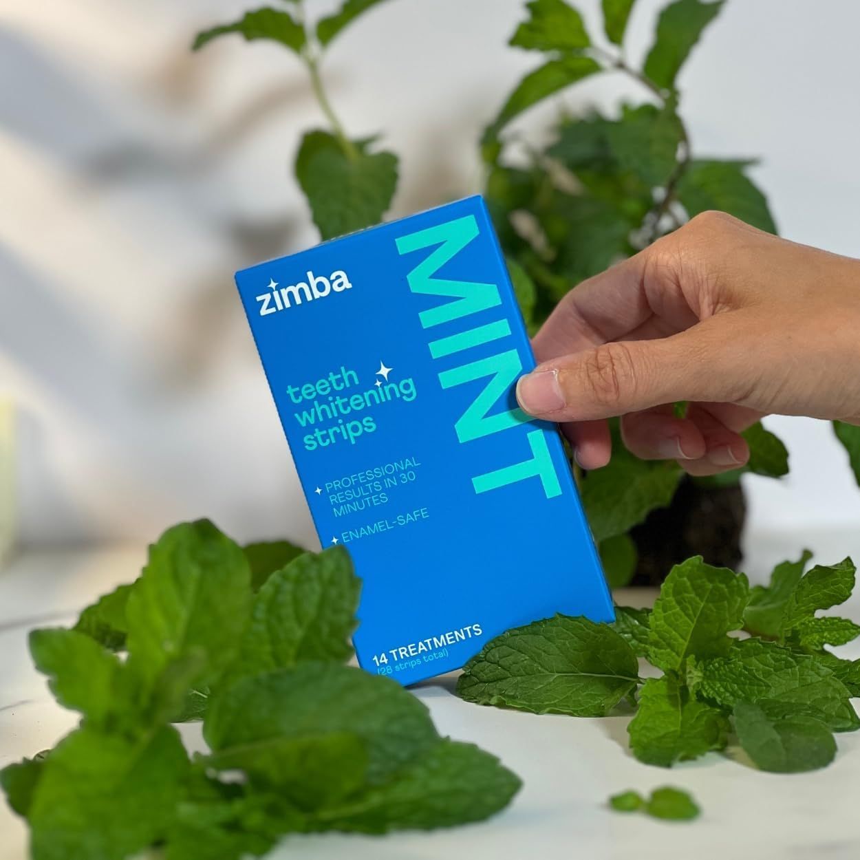 Showcases the product in a real-world lifestyle context with natural greenery to create an organic, appealing aesthetic and help shoppers visualize the product in their own environment.