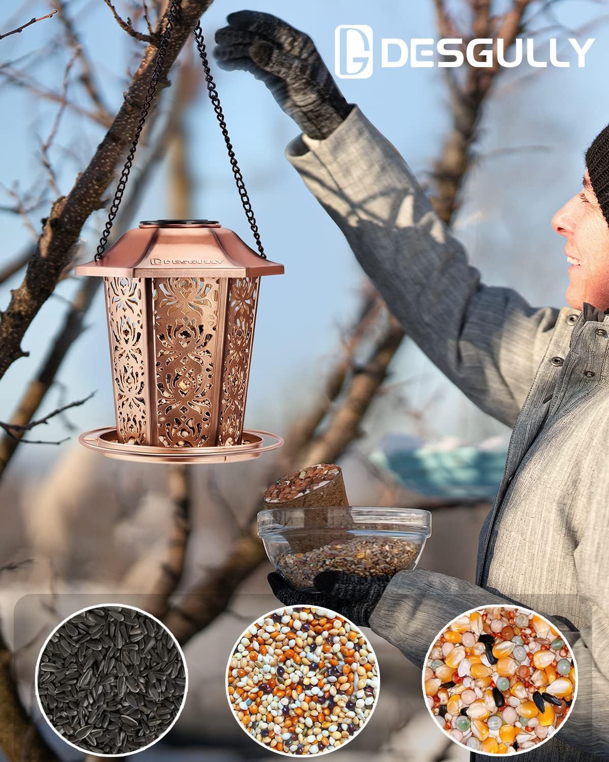 Demonstrates the bird feeder in a natural outdoor setting with a person hanging it in a tree, showing shoppers how the product looks and functions in real-world use. Shows the three types of bird…