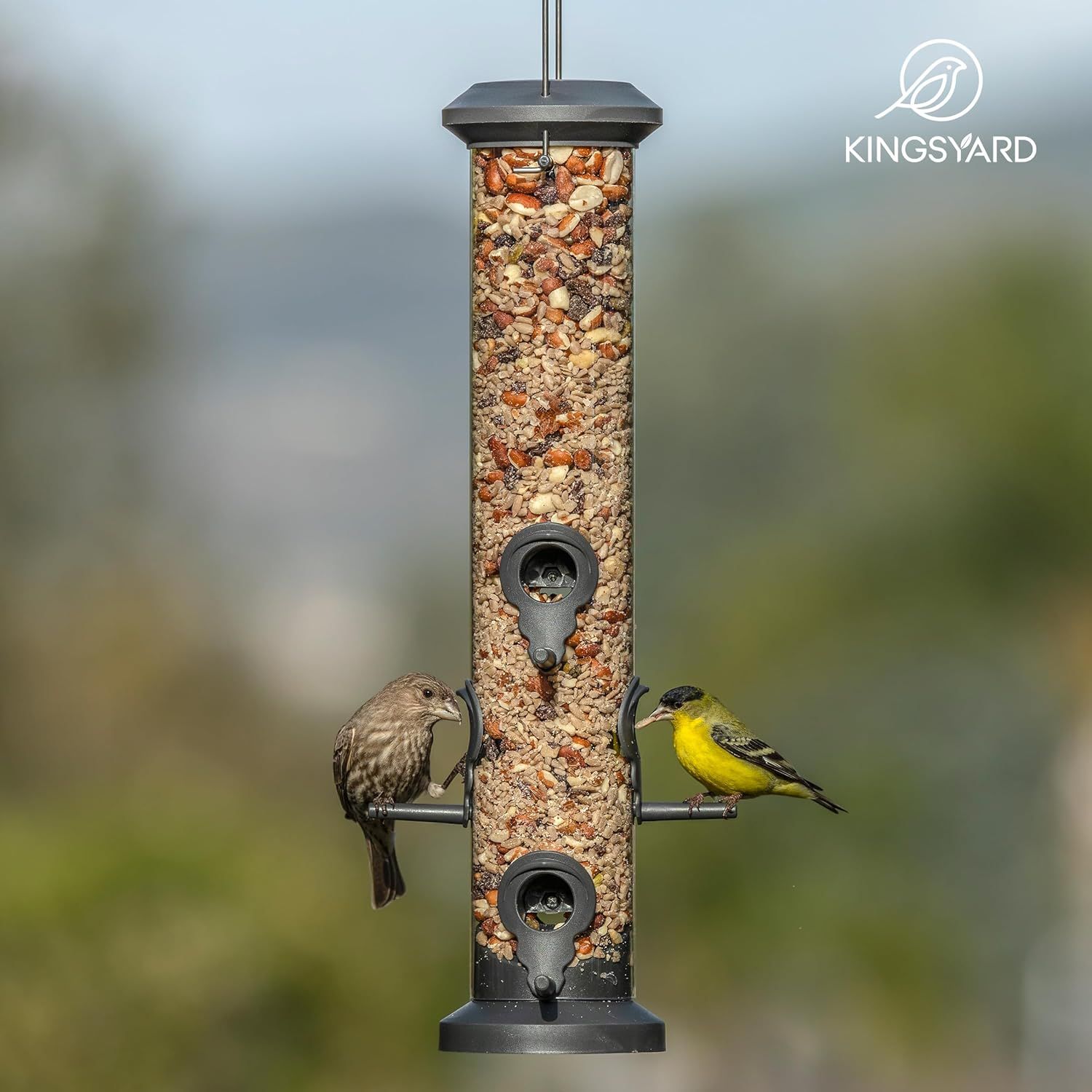Demonstrates the bird feeder in a real-world outdoor environment with actual birds using it, helping shoppers visualize the product in action and its effectiveness at attracting wildlife.