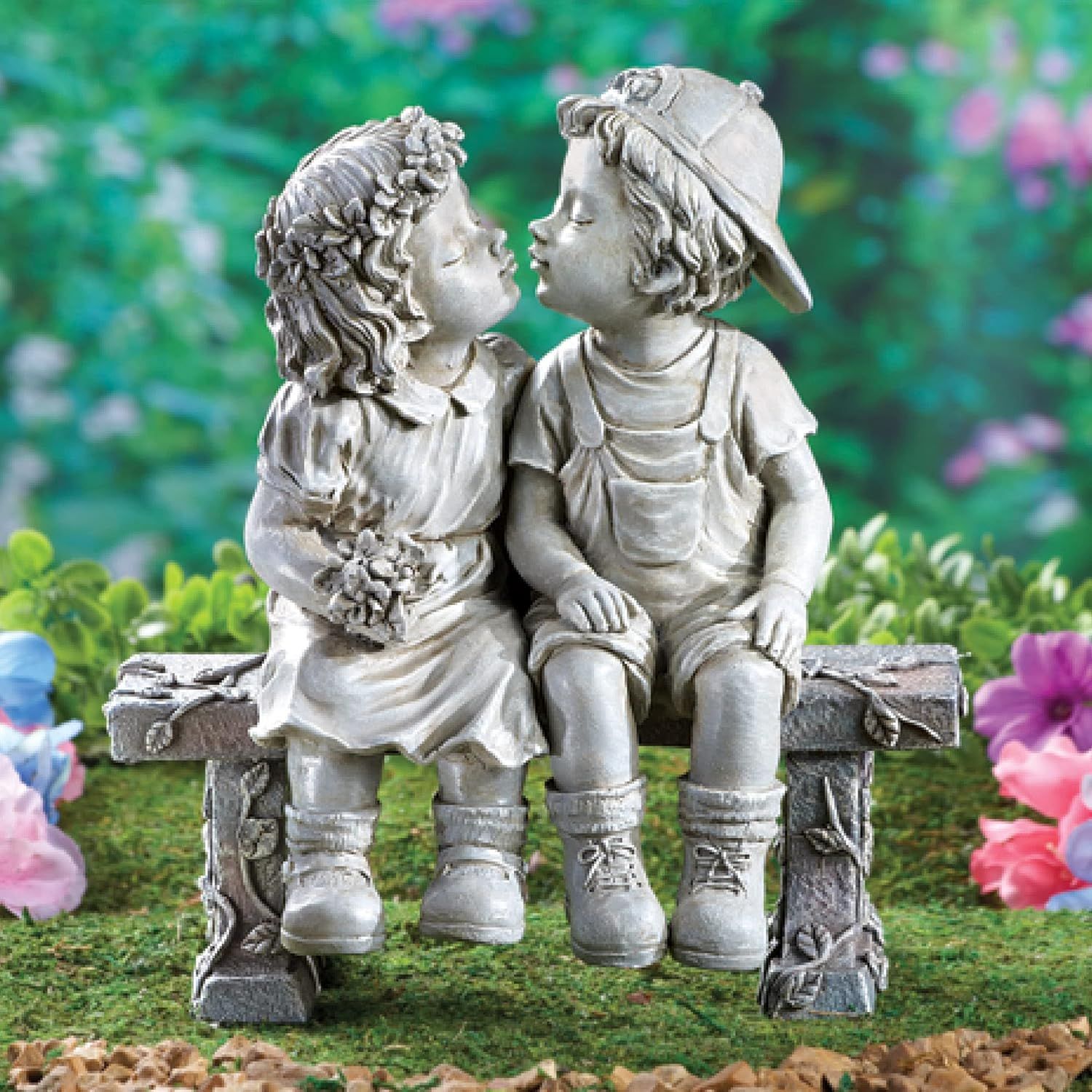Showcases the decorative garden statue in a natural outdoor setting to help shoppers visualize how it would look in their own garden or yard.