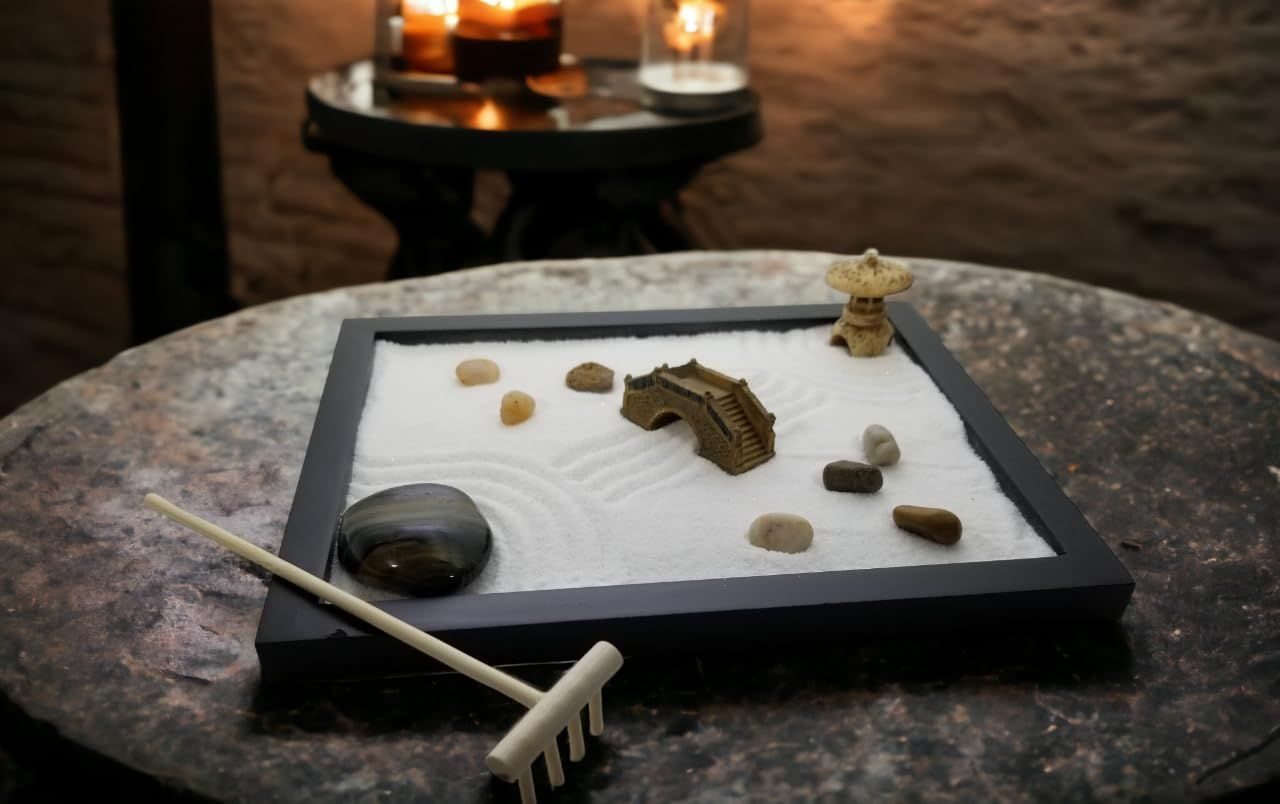 Showcases the product in a calming, real-world home environment with candles to communicate its use as a decorative, meditative piece for relaxation and ambiance.
