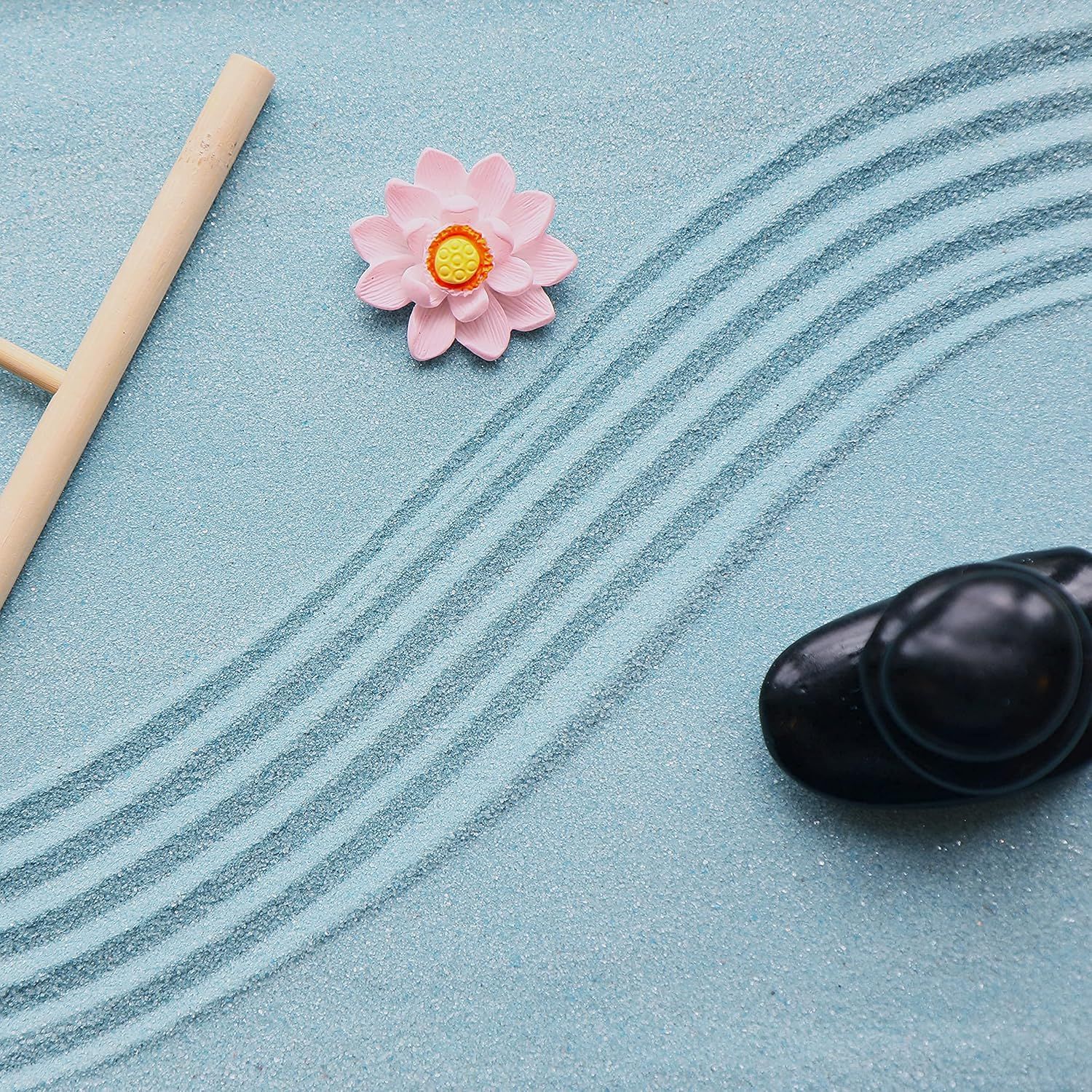 Communicates a calming, meditative aesthetic to position the product as part of a peaceful, mindful lifestyle or wellness routine.