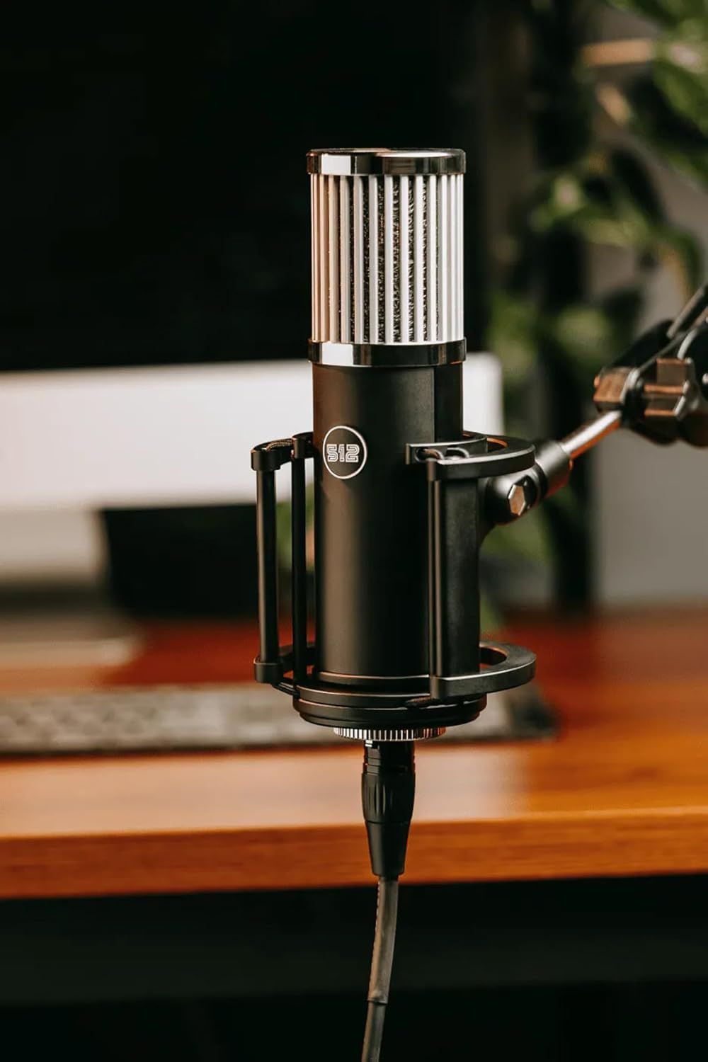 Showcases the product in a real-world professional environment to help shoppers visualize how it would look and fit in their own workspace or studio setup.
