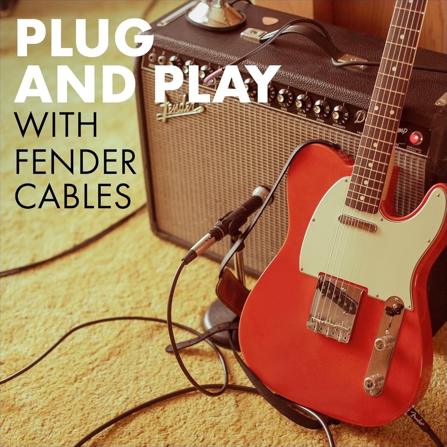 Shows the product (Fender cables) in an authentic lifestyle setting with a guitar and amplifier to help shoppers visualize how the cables are used in a real musical environment.