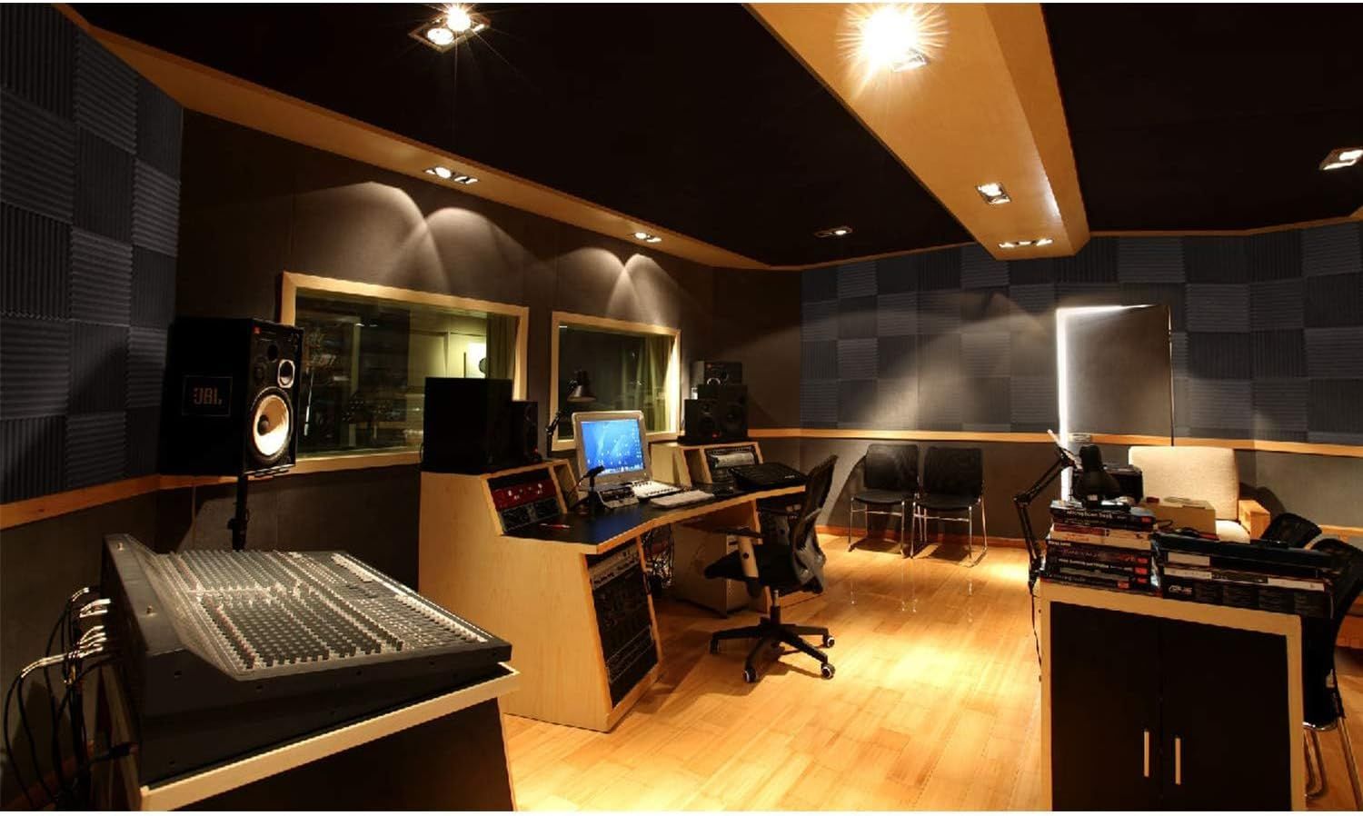 Demonstrates the product in a real-world professional recording studio setting to show its intended use context and appeal to audio professionals or musicians.