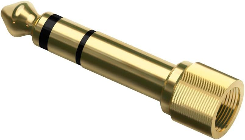 Displays the audio adapter product on a clean white background to show its physical appearance and gold finish without distractions.