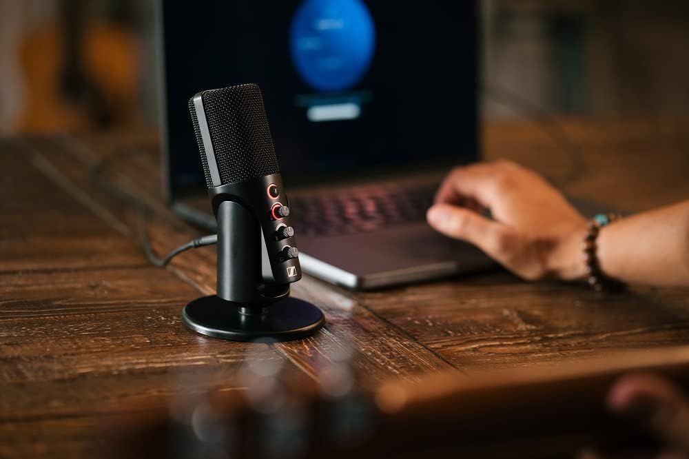 Demonstrates the product in a real-world recording or podcasting environment to help shoppers visualize how the microphone fits into their workspace and daily use.
