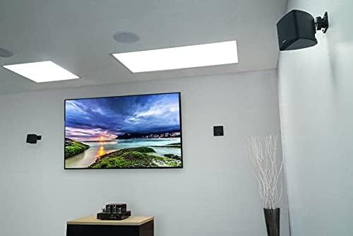 Demonstrates the product (TV mount) in a real-world home theater setting to help shoppers visualize how it would look installed in their own space.