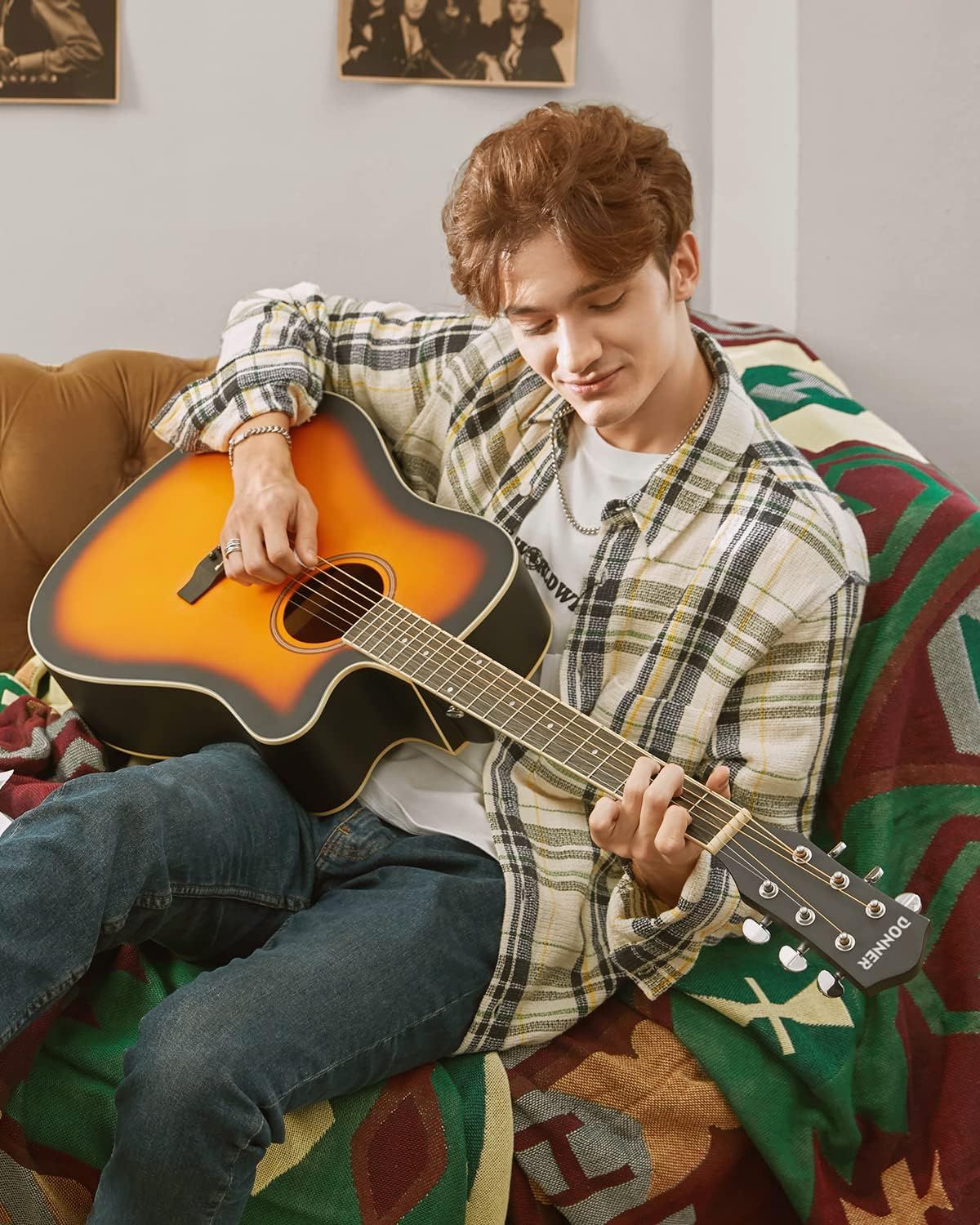 Demonstrates the guitar being used in a relaxed, real-world home setting to help shoppers visualize the product in their own lifestyle and connect emotionally with the product.