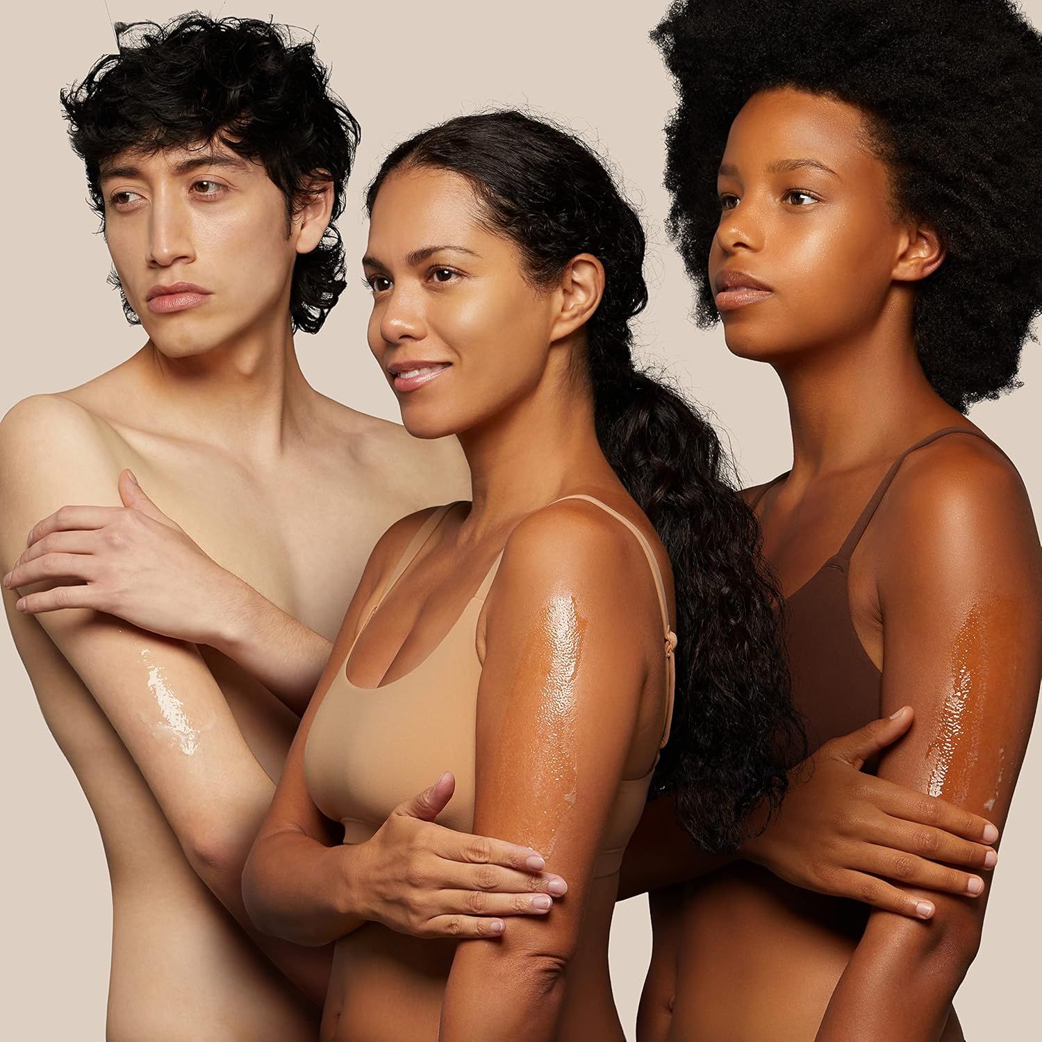 Demonstrates the brand's commitment to inclusivity by showcasing the product on three models with different skin tones, reassuring shoppers that the product works across diverse complexions.