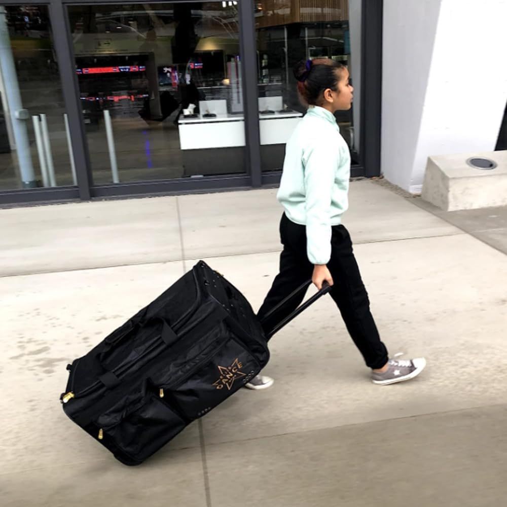 Demonstrates the product in a real-world travel scenario, showing a young person easily pulling the rolling bag through an urban environment to communicate its practical portability and…