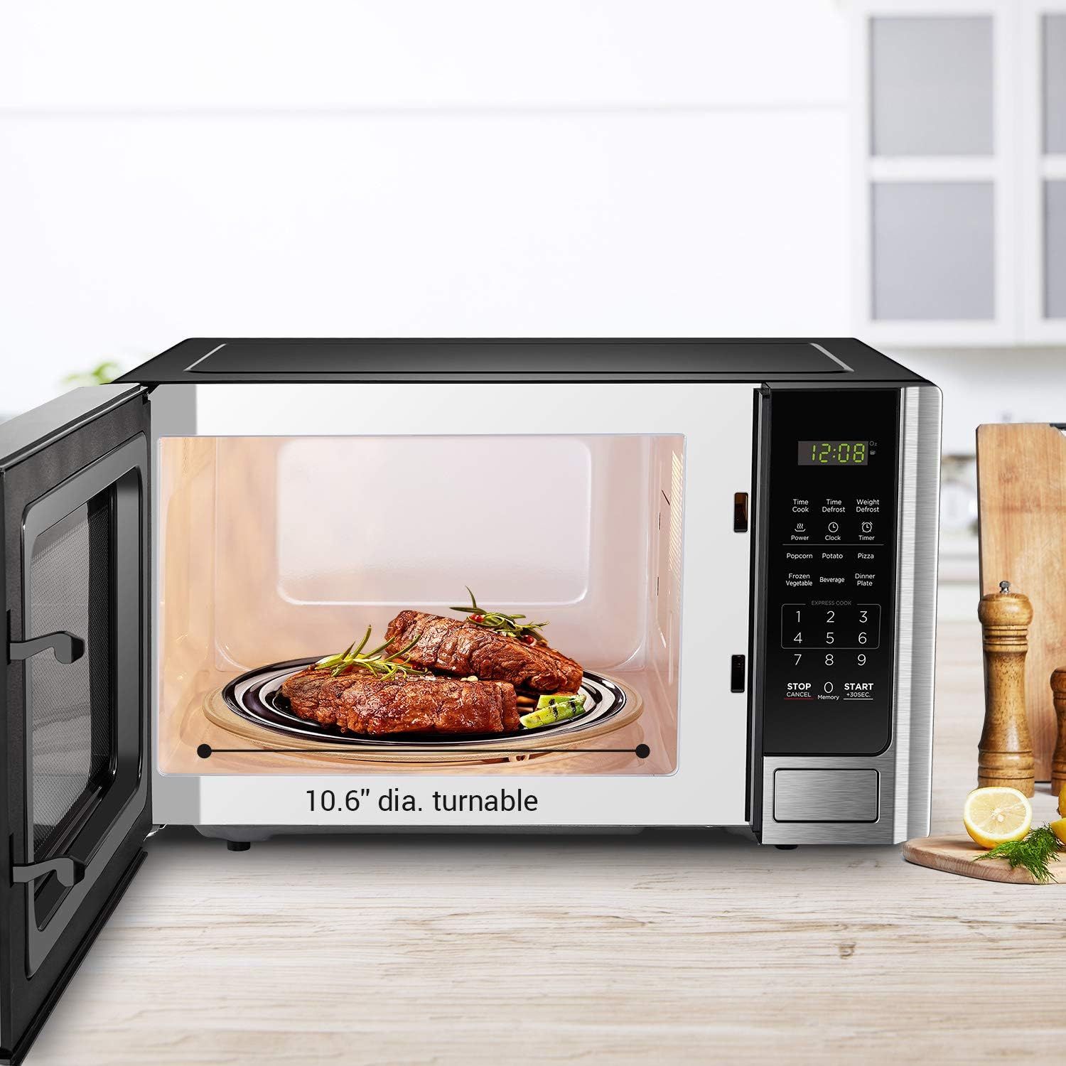 Communicates the interior capacity of the microwave by showing the exact turntable diameter measurement, helping shoppers understand how much food can fit inside. Demonstrates the spacious interior…