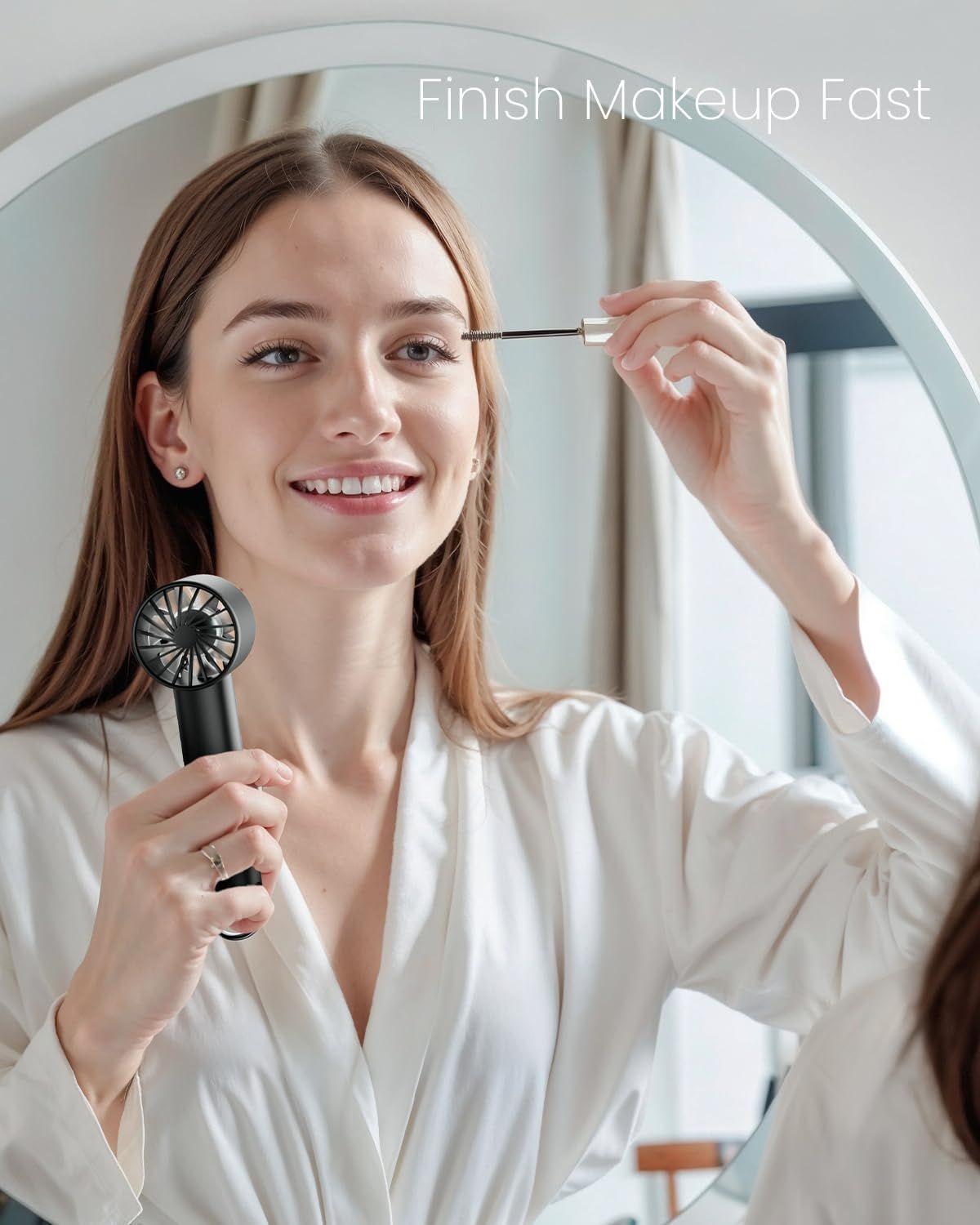 Communicates that the handheld fan helps users finish their makeup quickly by speeding up drying time, appealing to shoppers who value time-saving beauty solutions.