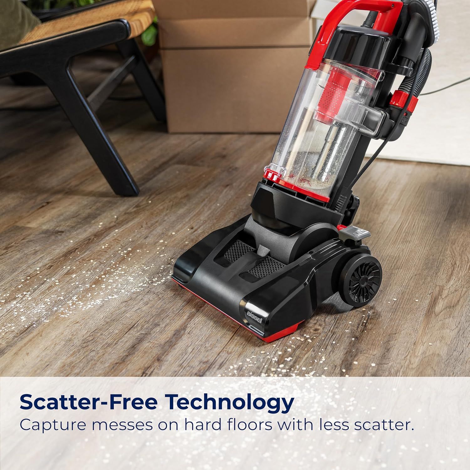 Communicates that the vacuum captures debris on hard floors without scattering it, reassuring shoppers about effective and mess-free cleaning performance.