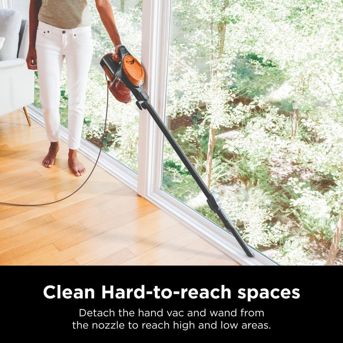 Demonstrates how to use the vacuum's detachable wand feature to clean hard-to-reach spaces like high windows and baseboards, emphasizing ease of use and versatility. Highlights the product's ability…