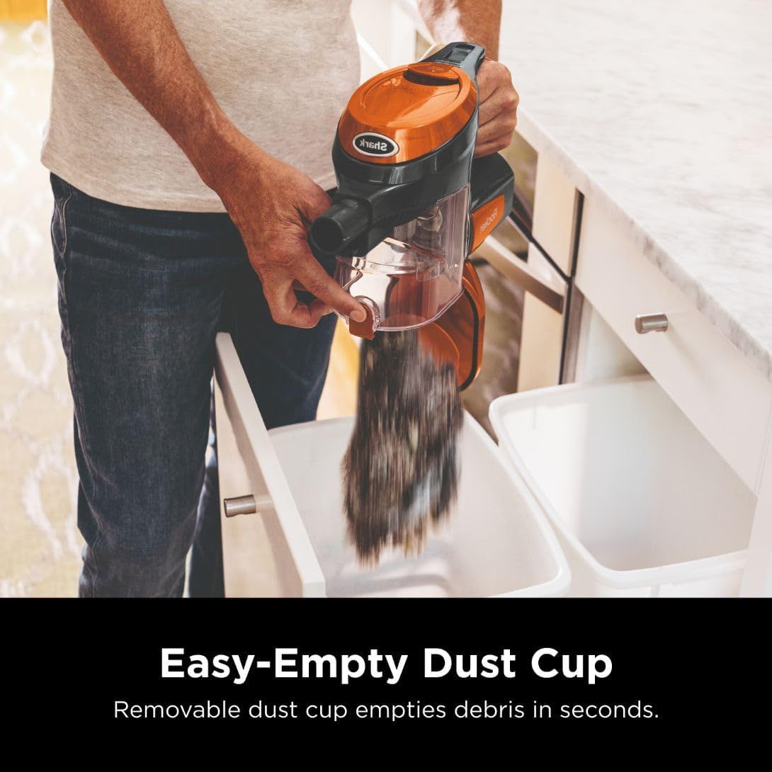 Demonstrates the convenience of the removable dust cup feature, showing how quickly and easily users can empty debris in seconds.