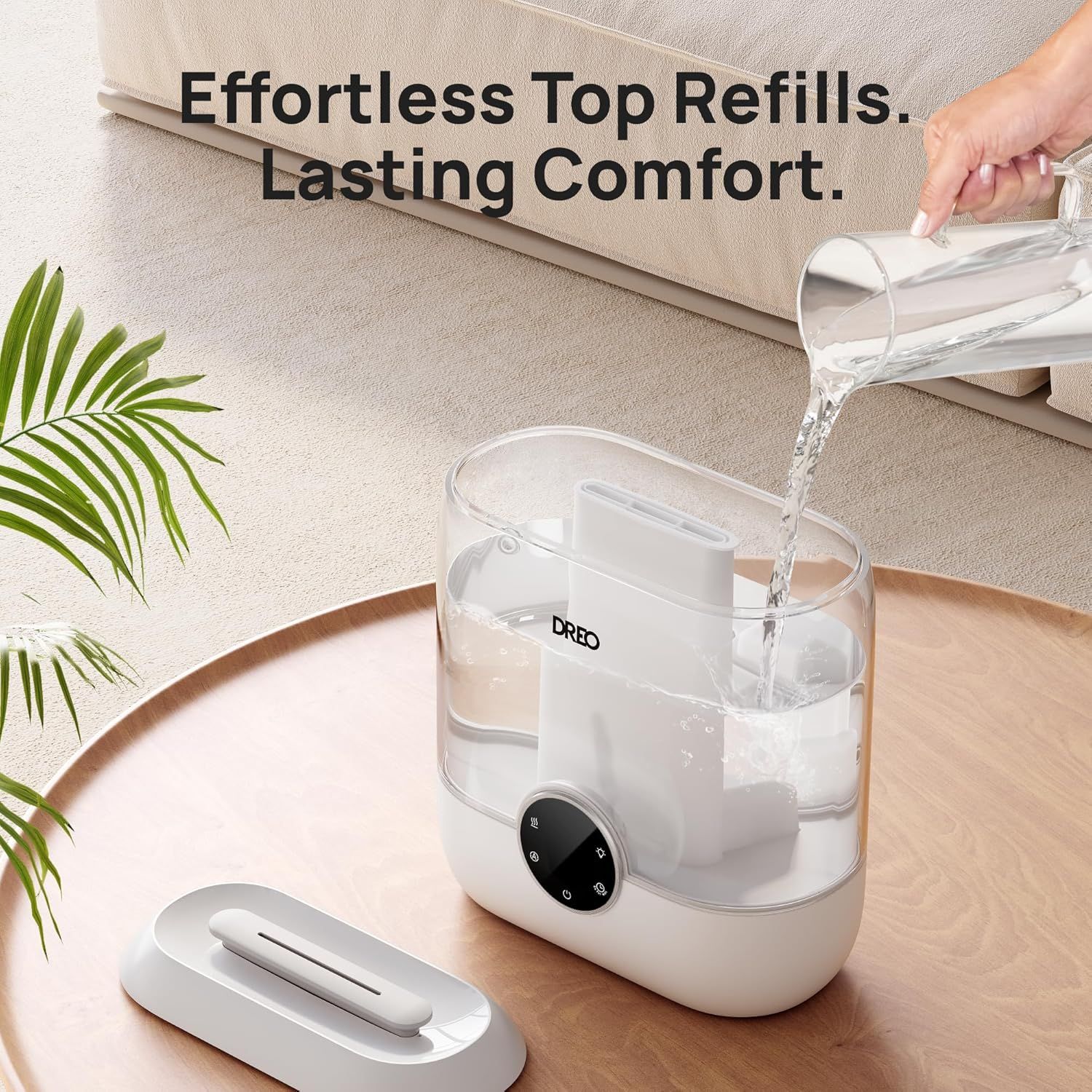 Demonstrates how easy it is to refill the humidifier from the top, emphasizing convenience and effortless maintenance for the shopper. Highlights the key benefit of easy top refilling and lasting…