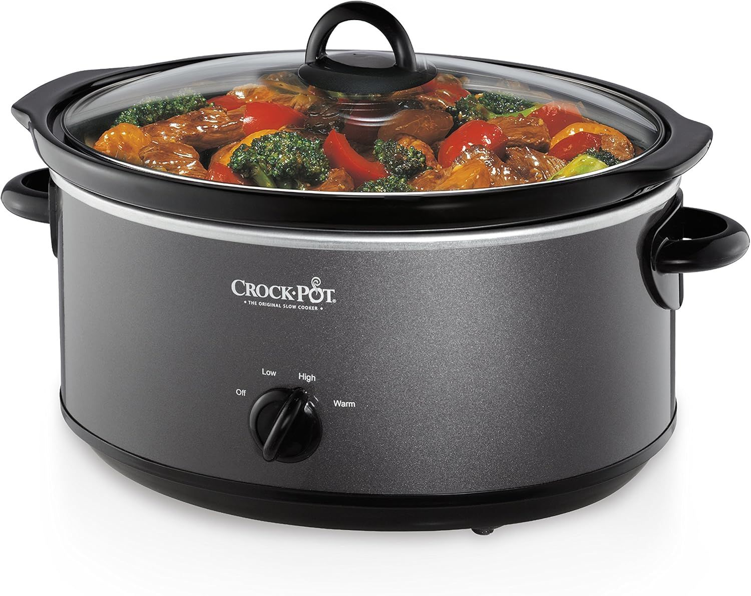 Shows the slow cooker in action with a finished meal visible through the glass lid, helping shoppers visualize the product in real-world use and the type of meals they can prepare.