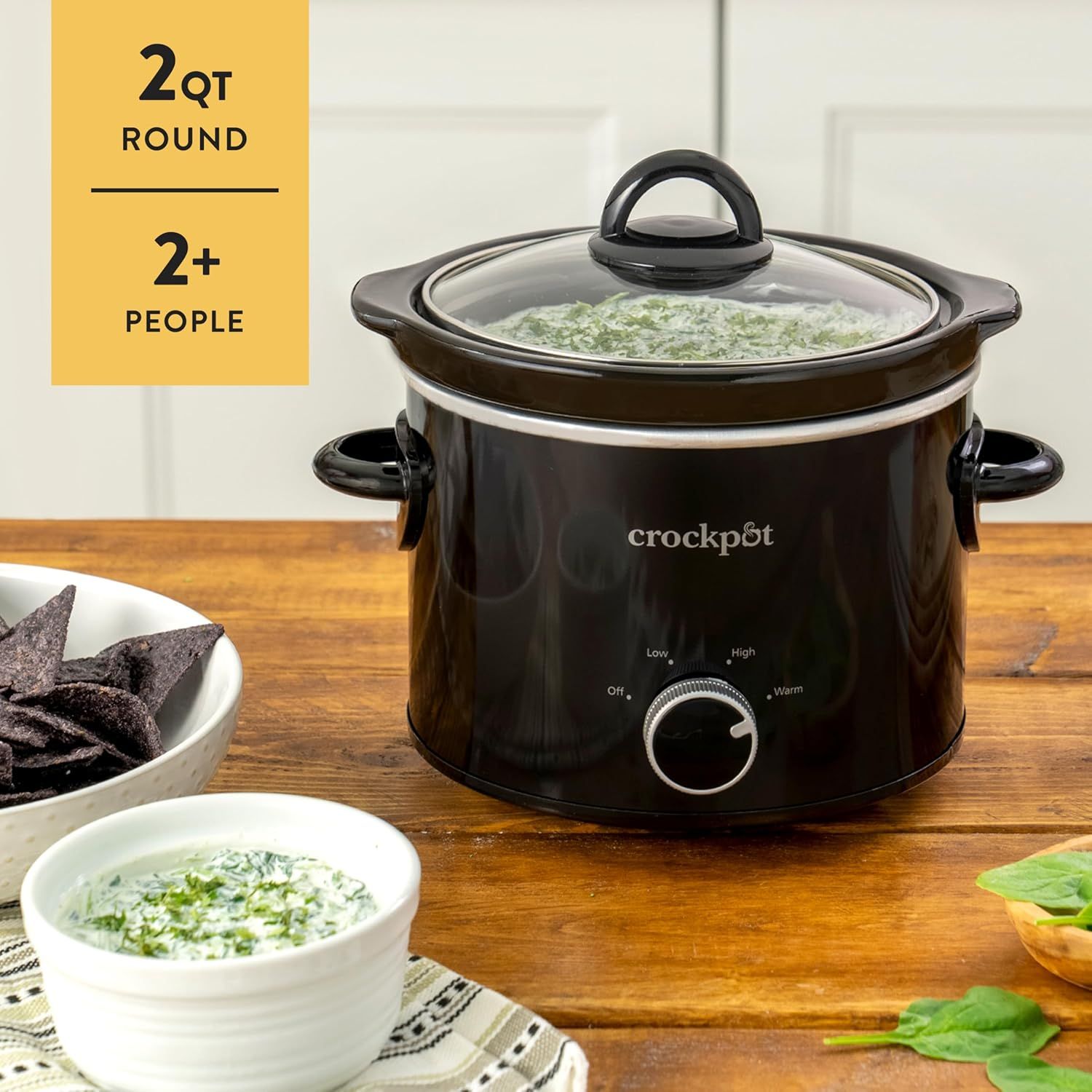 Communicates the product's capacity and serving size to help shoppers understand if it meets their household needs. Shows the Crockpot in a real-world kitchen context with prepared food to help…
