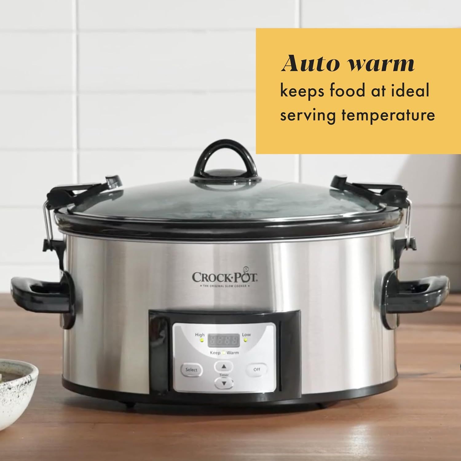 Highlights the auto warm feature that keeps food at ideal serving temperature, reassuring shoppers of convenience and food quality maintenance.