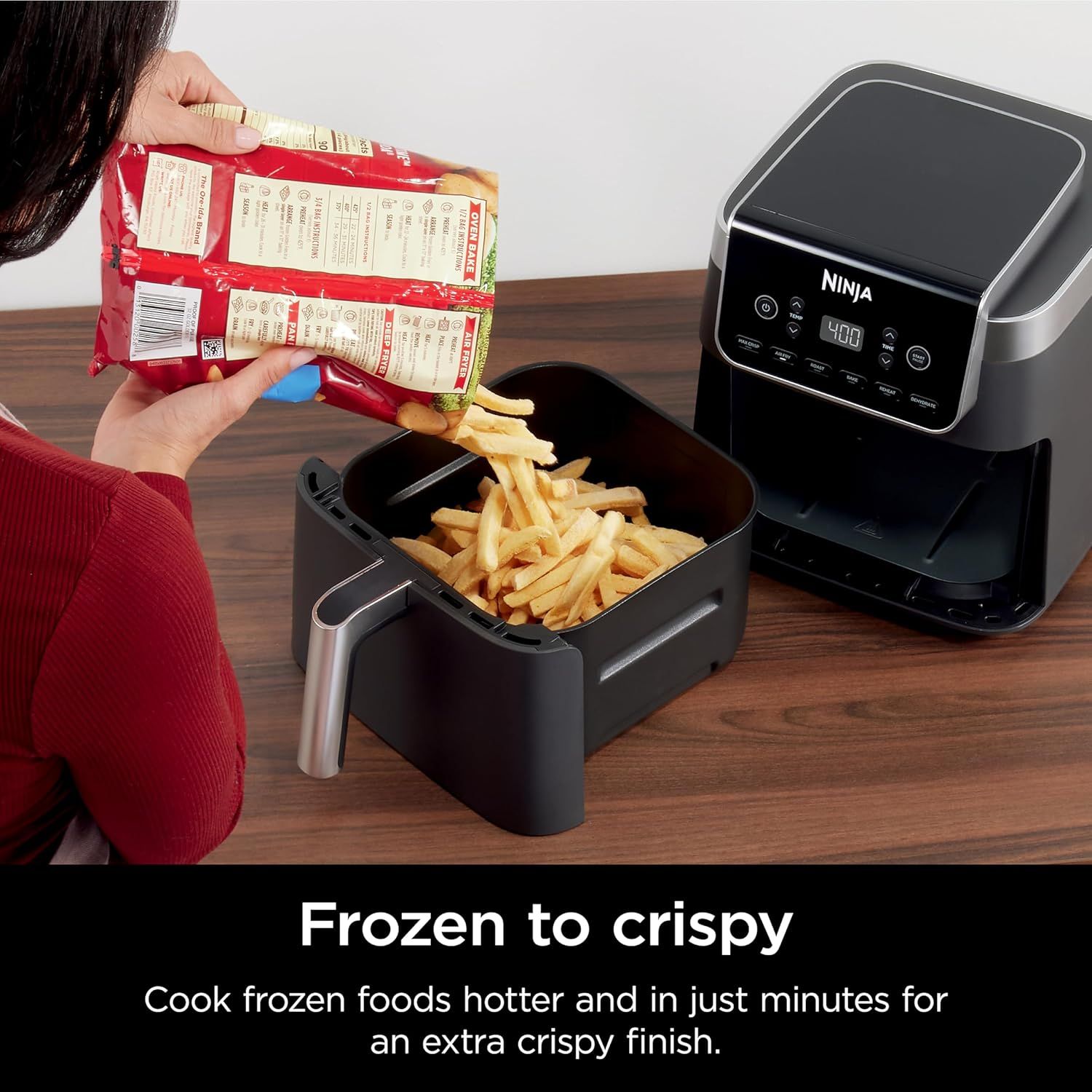 Demonstrates that the Ninja air fryer can cook frozen foods directly to a crispy finish in minutes, emphasizing convenience and time-saving benefits for shoppers.