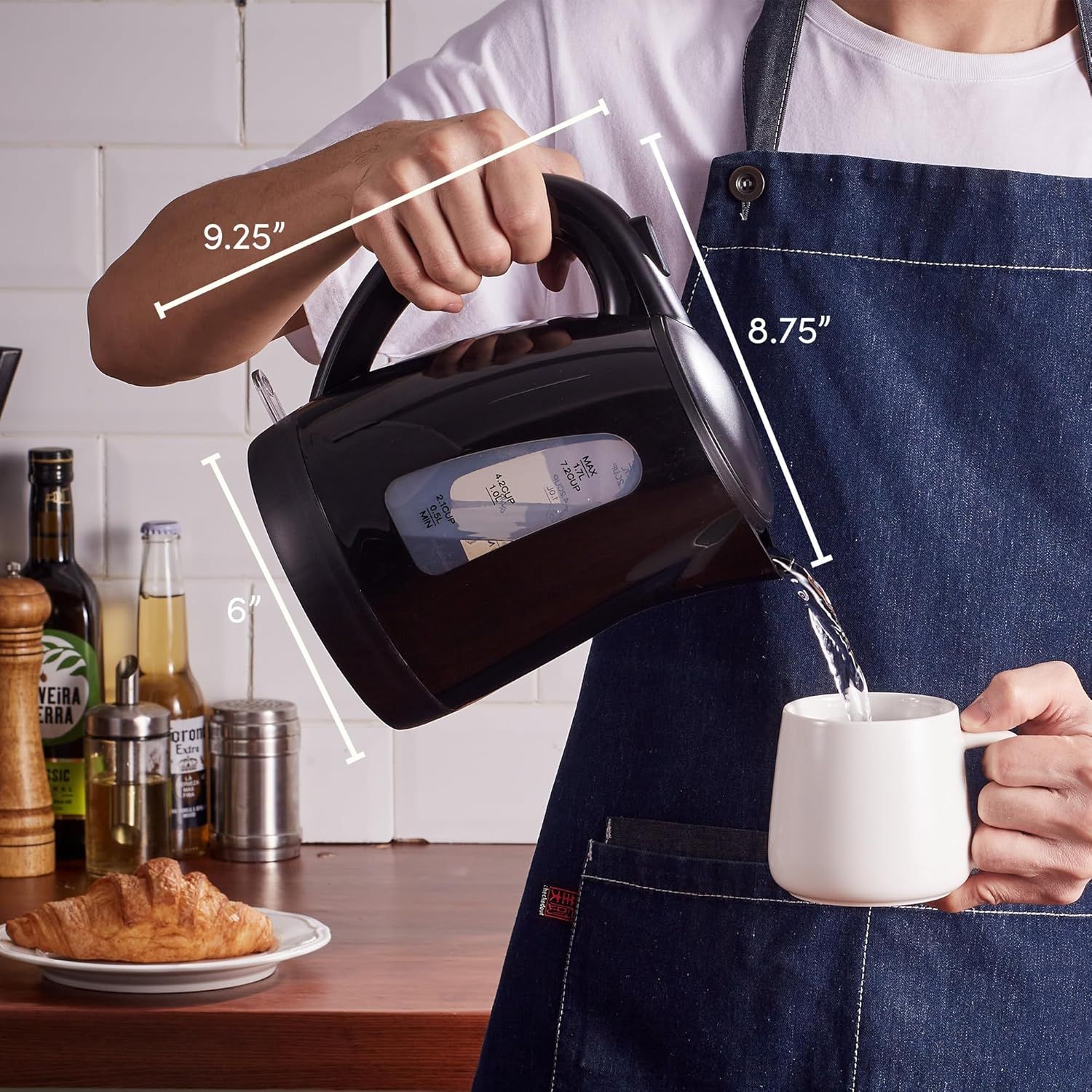 Communicates the exact physical dimensions of the kettle to help shoppers understand its size and whether it will fit their kitchen space and storage needs.