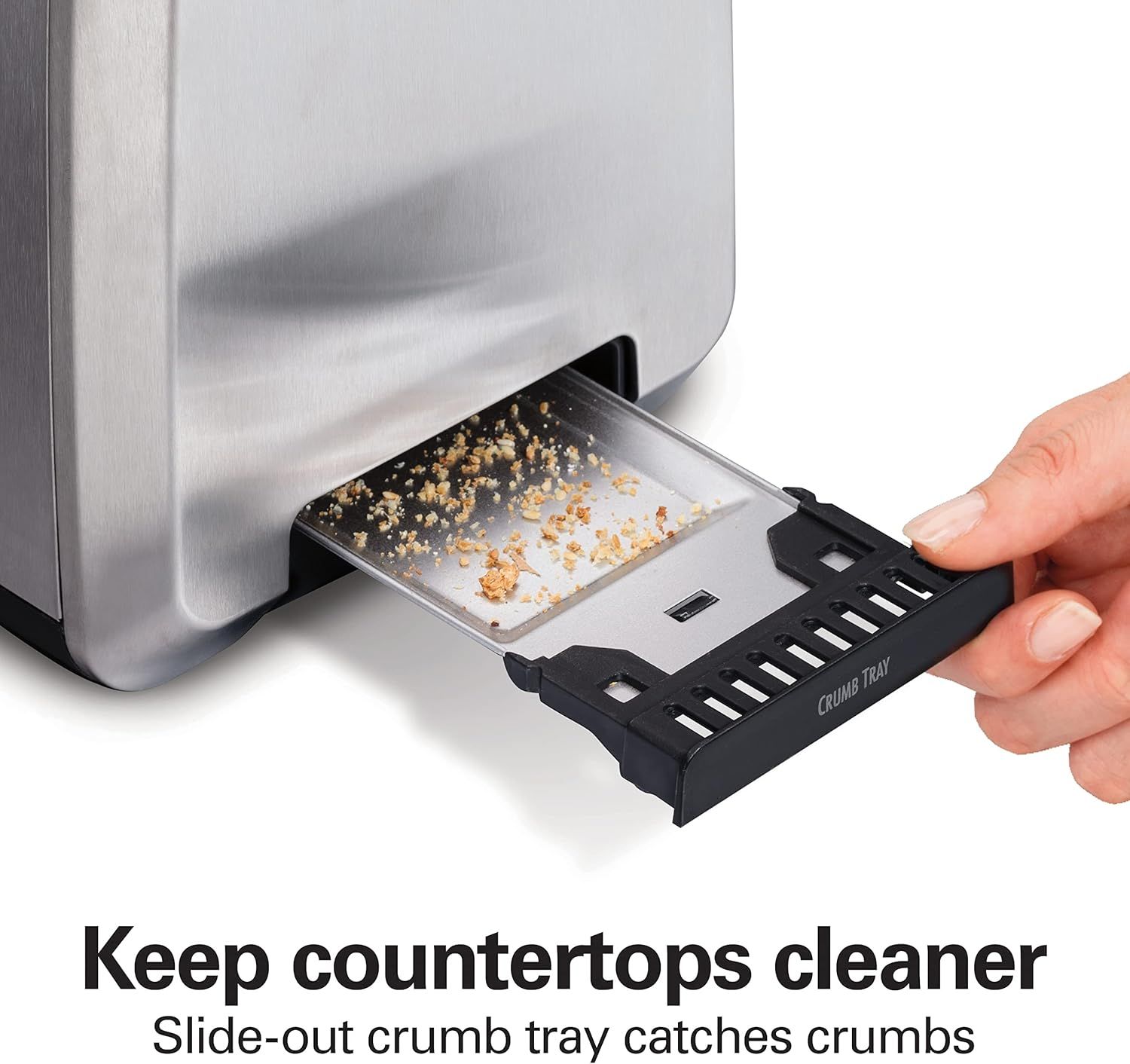 Demonstrates the slide-out crumb tray feature that catches crumbs and keeps countertops clean, reassuring shoppers about easy maintenance and cleanliness.
