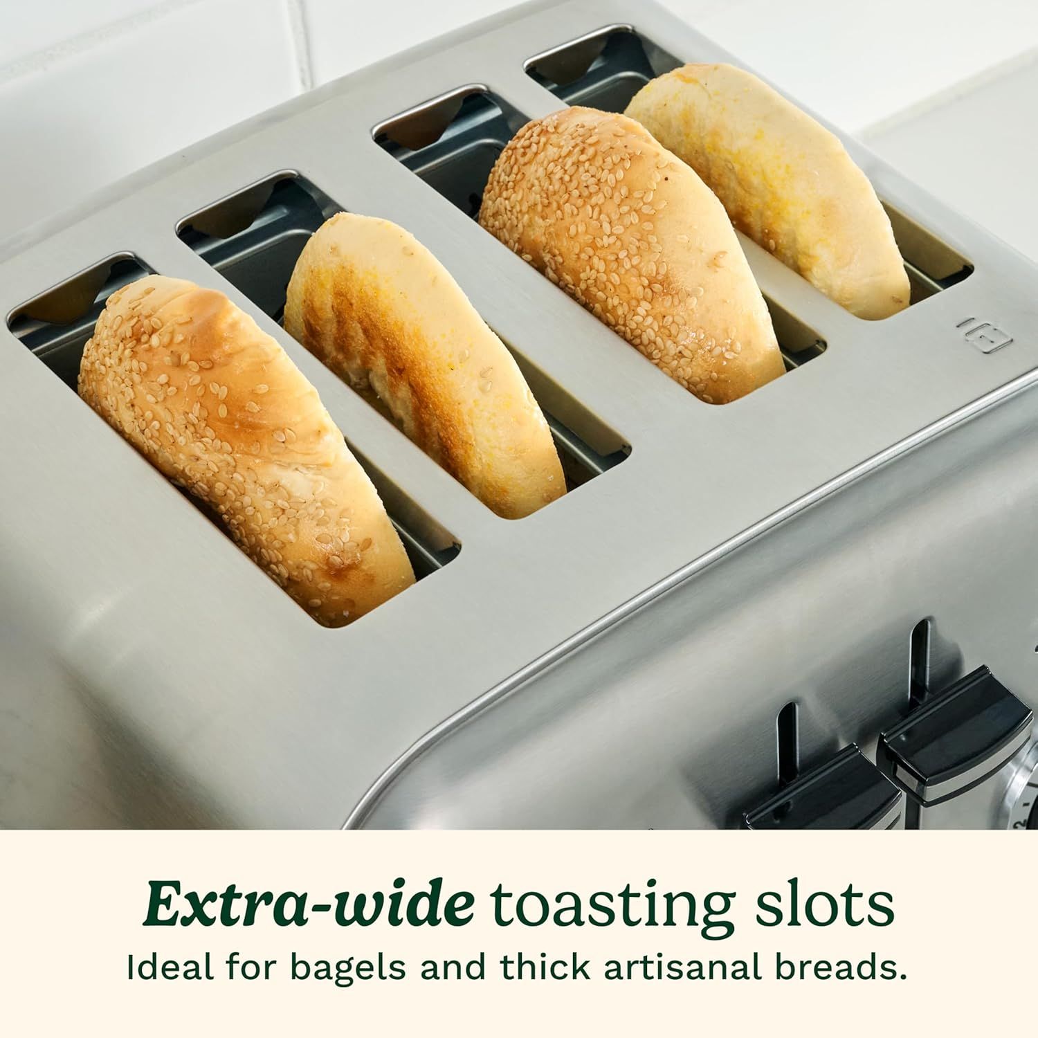 Highlights the toaster's extra-wide slots to reassure shoppers that it can accommodate bagels and thick artisanal breads, solving a common pain point with standard toasters.