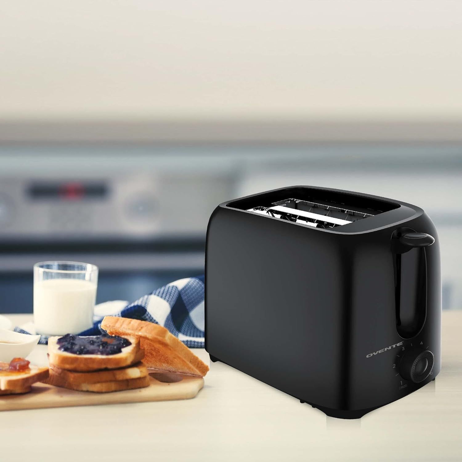Shows the toaster in a real-world breakfast context to help shoppers visualize the product in their own home and daily routine.