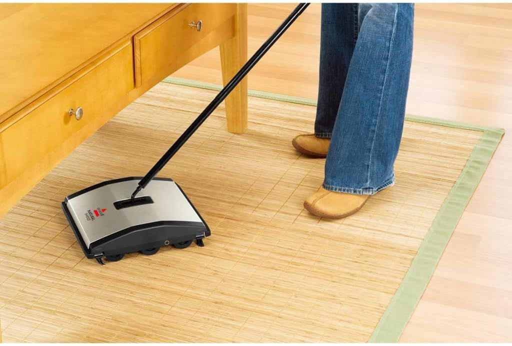 Shows the product being used in a realistic home environment to help shoppers visualize how it fits into their daily cleaning routine.