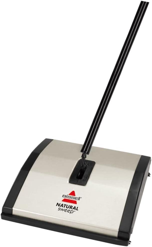 Provides a clean, catalog-style view of the Bissell Natural Sweep manual carpet sweeper to show the product clearly without distractions.