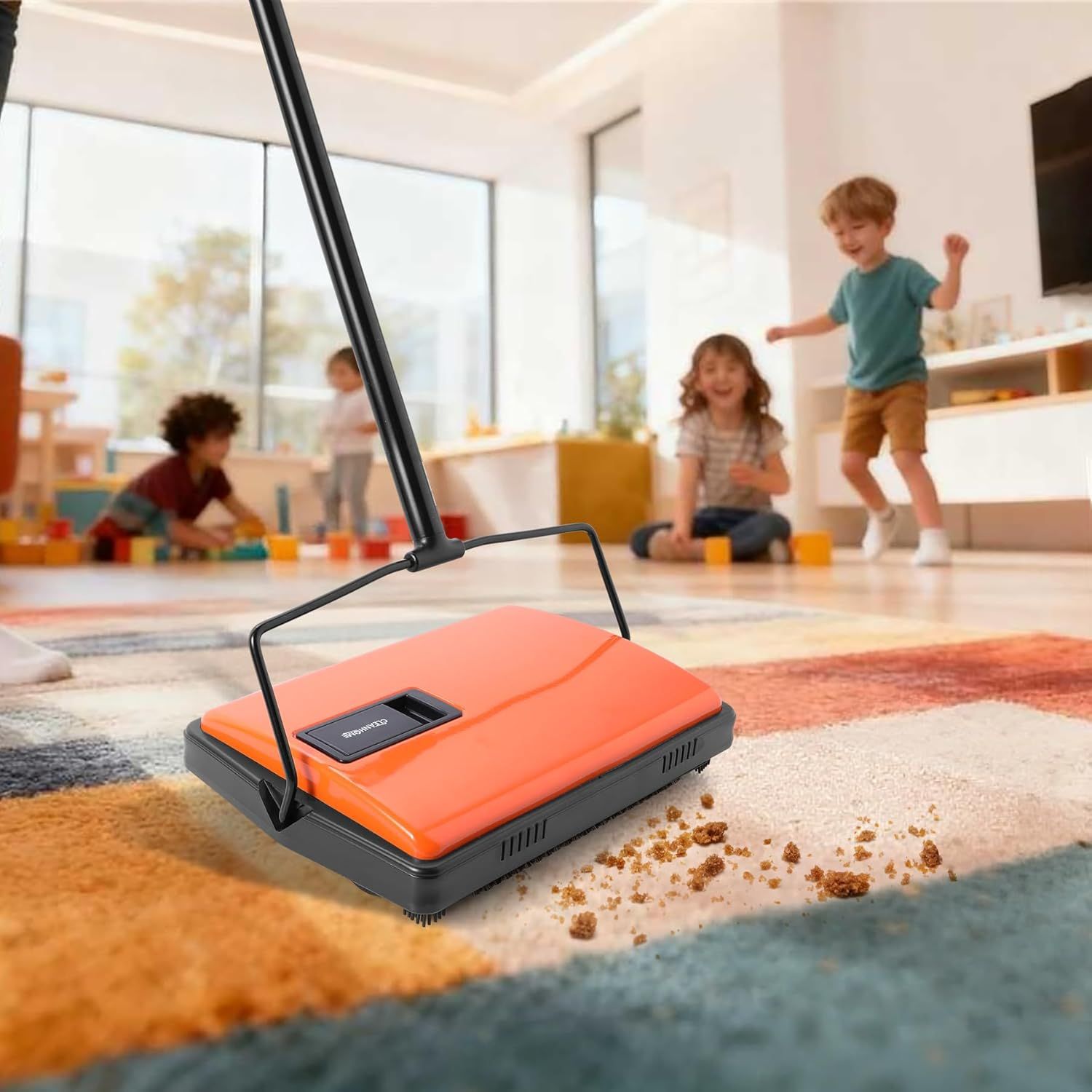 Demonstrates the product in a real-world family setting, showing it cleaning up crumbs on a carpet while children play in the background, helping shoppers visualize the product in their own homes.