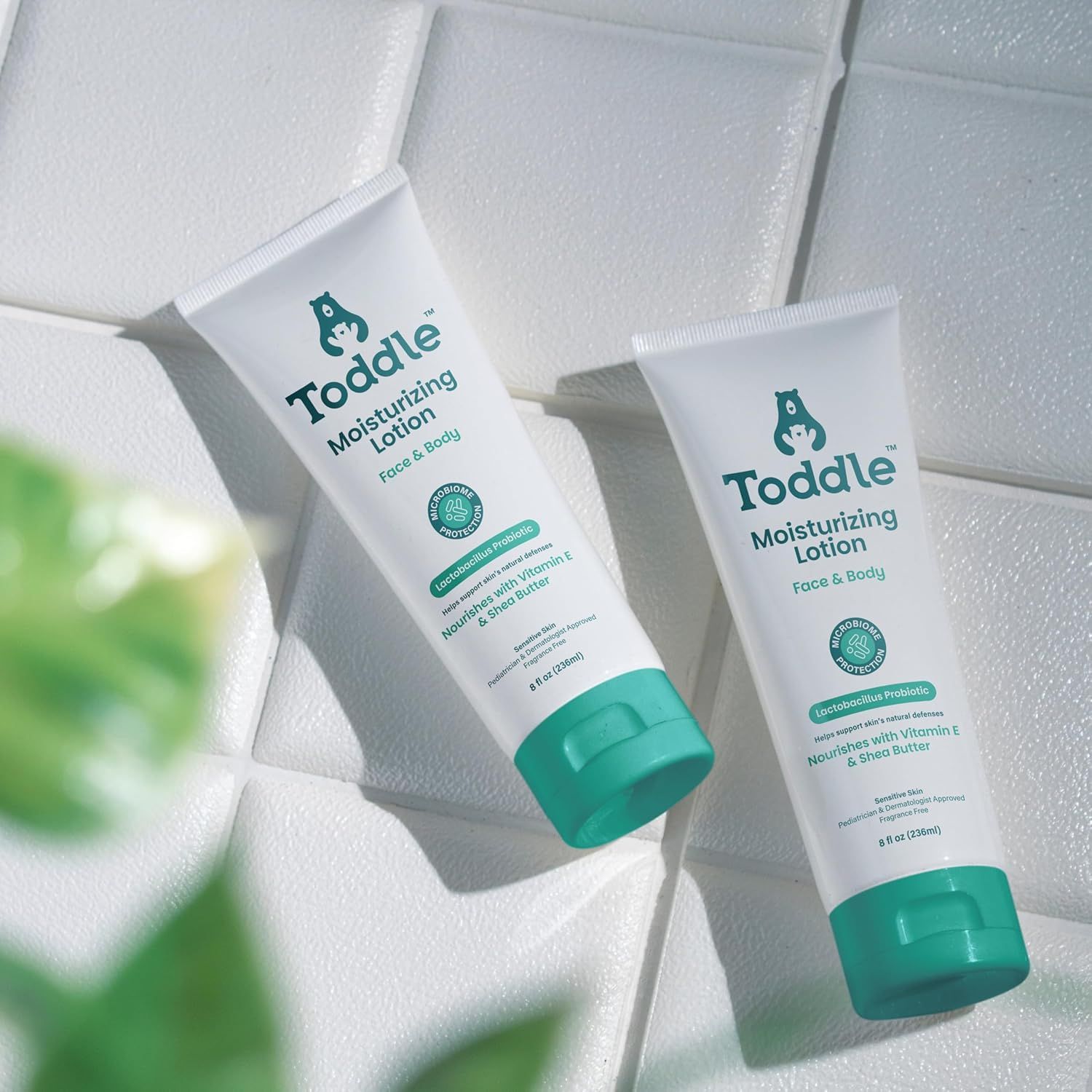 Showcases the brand's product lineup by displaying two different sizes of the same moisturizing lotion, helping shoppers understand the available size options.