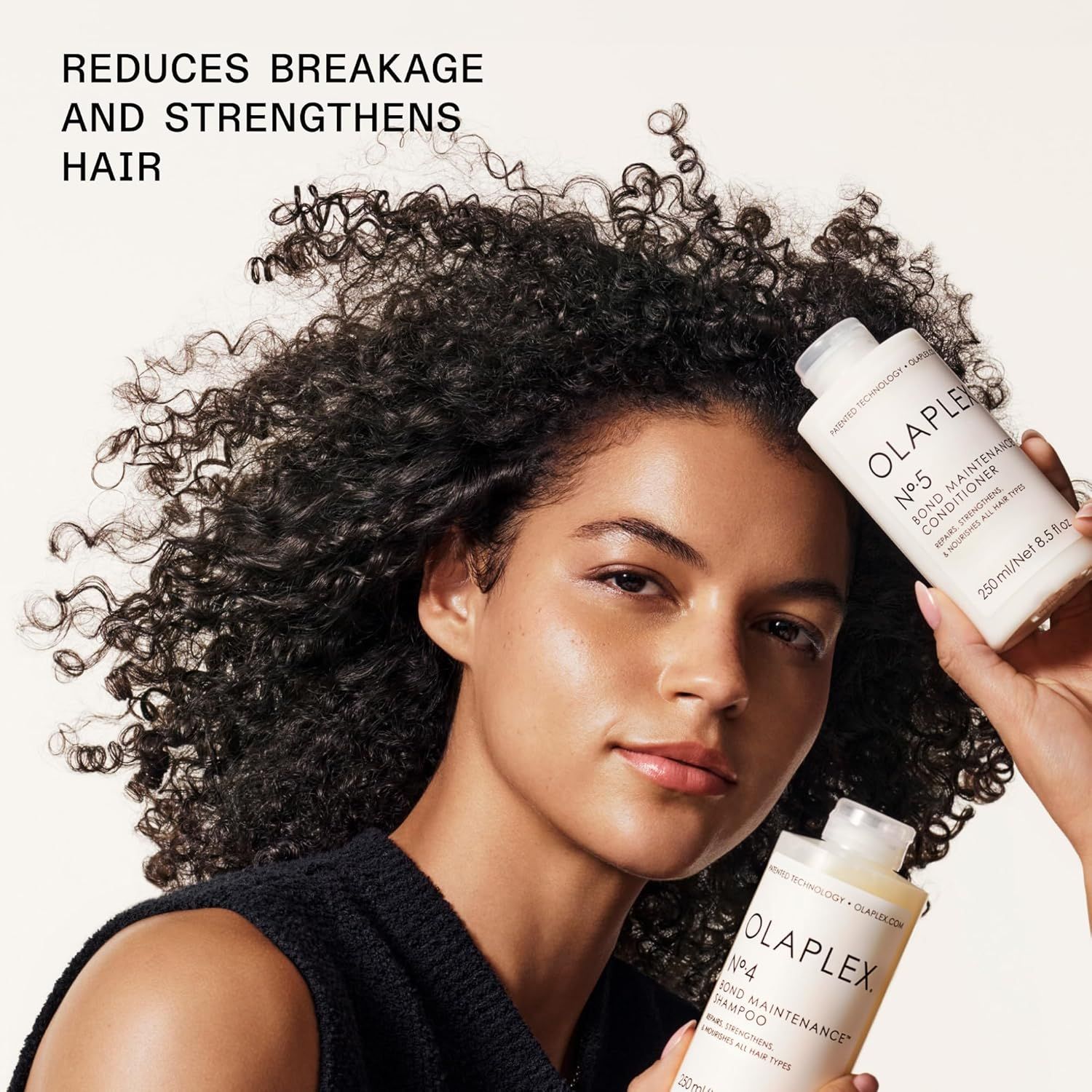Communicates the primary benefit of the hair care products—reducing breakage and strengthening hair—through a clean lifestyle photo with a single headline and product display.