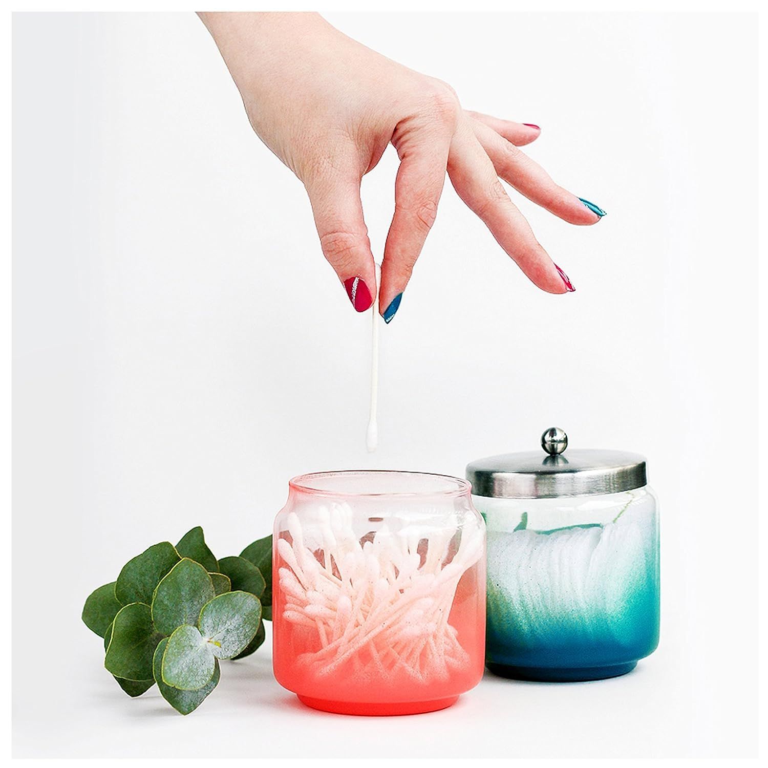 Demonstrates how to use the product by showing a hand inserting a wick into the candle jar, communicating the simple setup process for making candles. Highlights the simplicity and ease of using the…