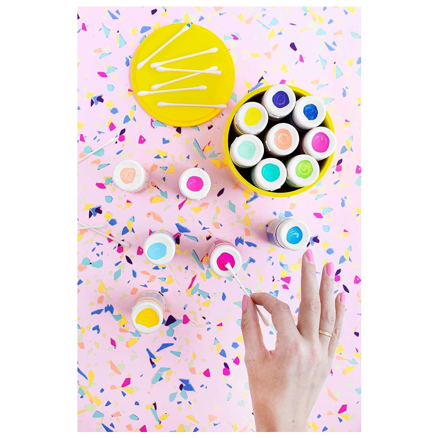 Shows all the colorful paint or craft product containers included in the set, demonstrating variety and value to help shoppers understand what they receive with their purchase.