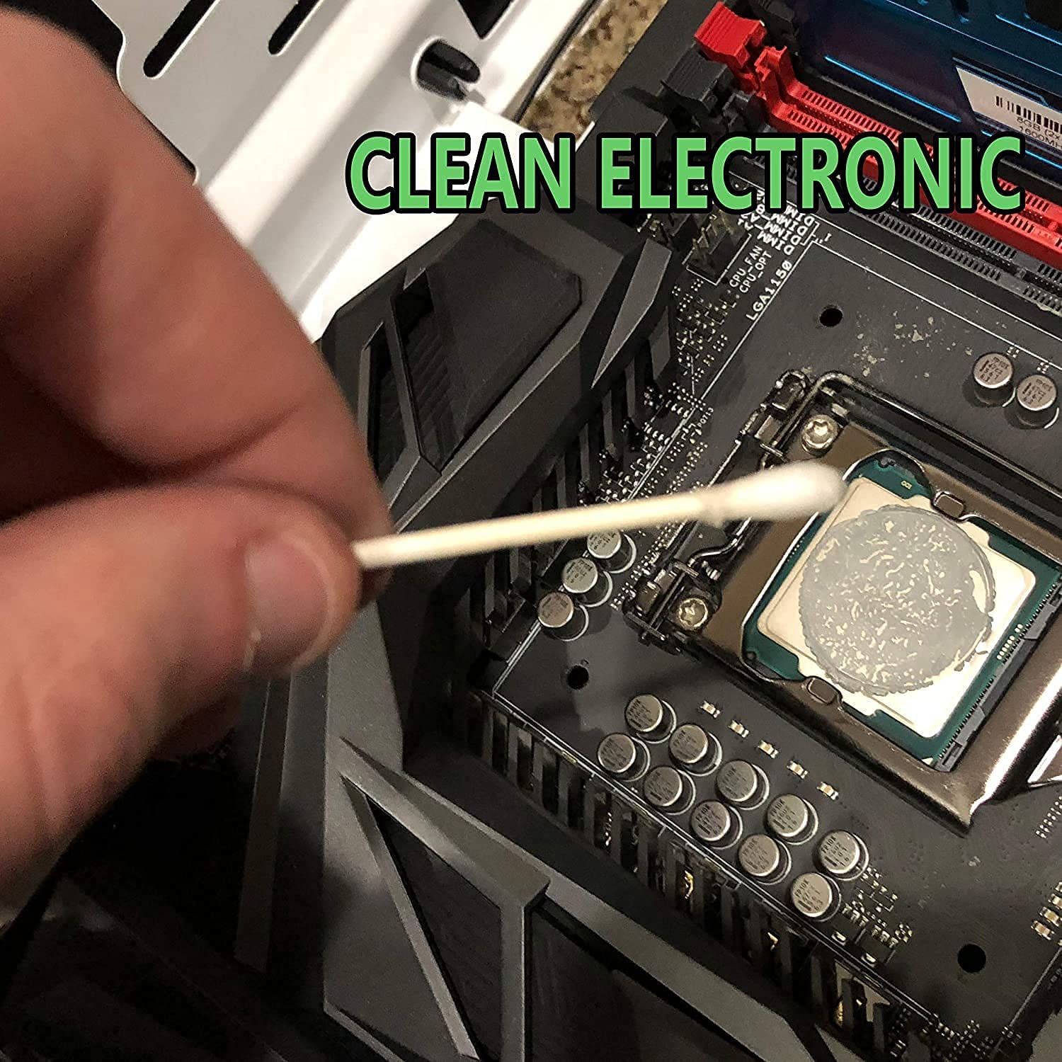 Demonstrates how to clean electronic components, specifically showing the process of cleaning a computer motherboard to reassure shoppers about proper maintenance techniques.