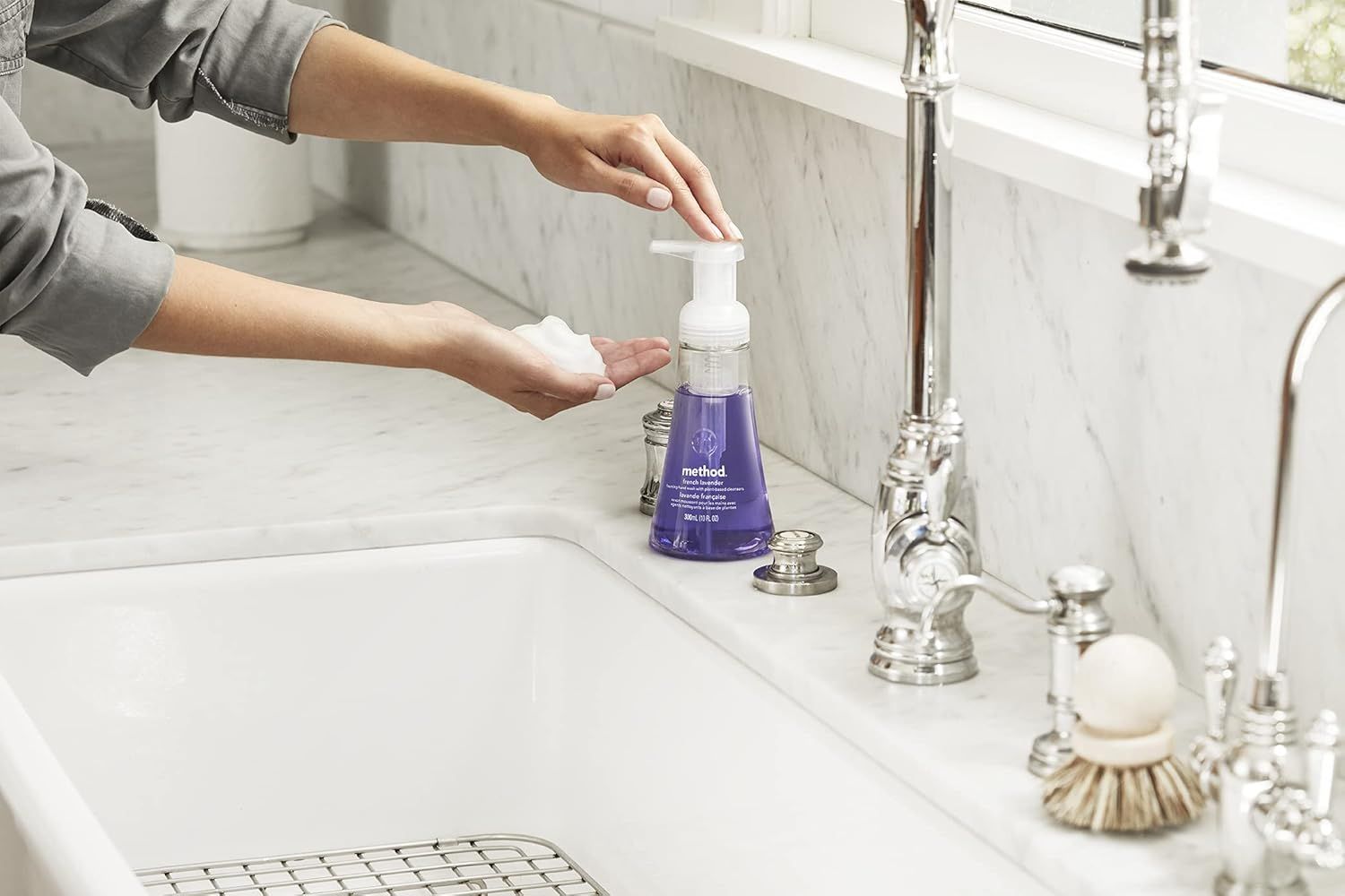 Shows the product being used naturally in a real bathroom environment to help shoppers visualize the product in their own home.
