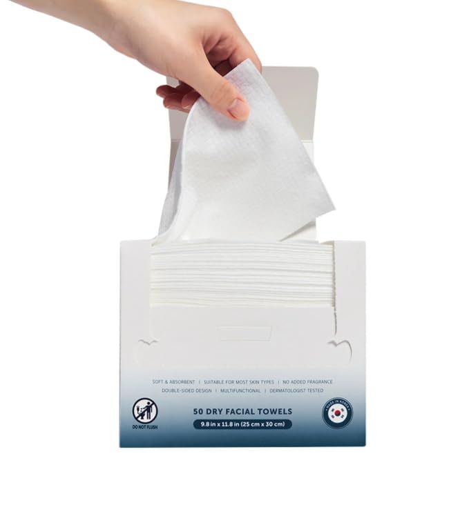 Shows the product in its packaging on a clean white background to give shoppers a clear view of what they will receive, including the dispenser box and individual facial towels.