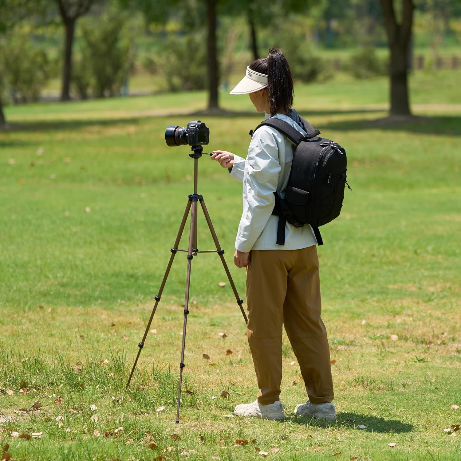 Demonstrates the product in a real-world outdoor photography scenario to help shoppers visualize themselves using the product in nature settings.