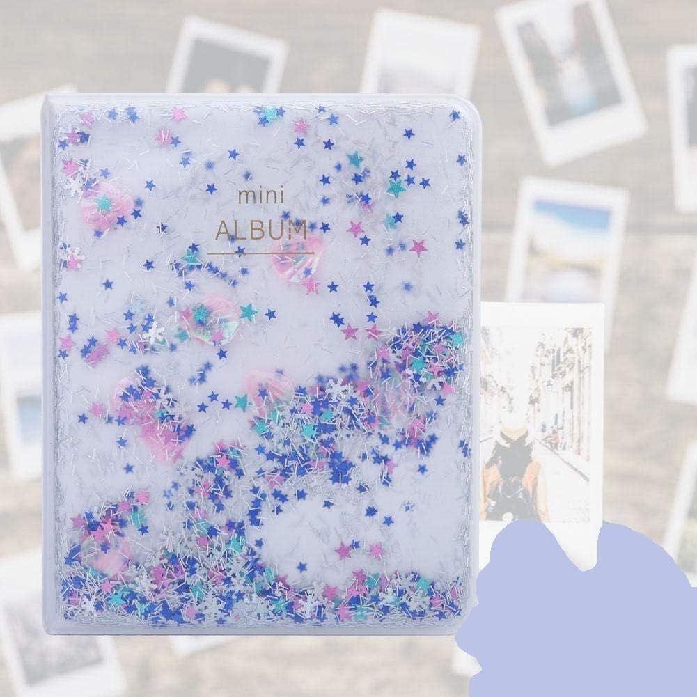 Displays the mini photo album product in a clean, catalog-style presentation to show its physical appearance and decorative design with glitter stars.