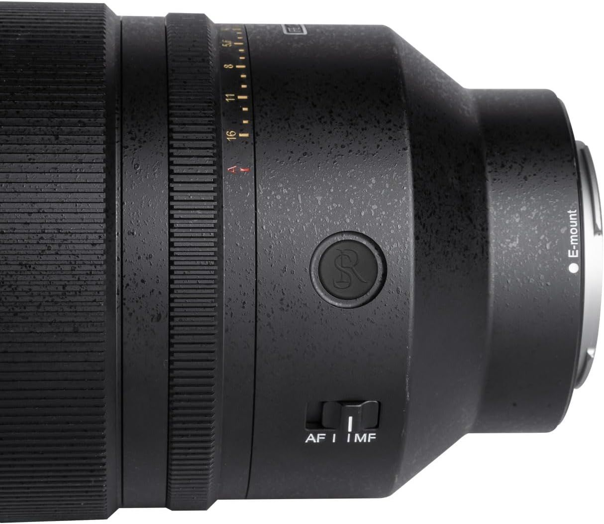 Provides a clean, detailed view of the camera lens showing its physical design, build quality, and controls without distractions.