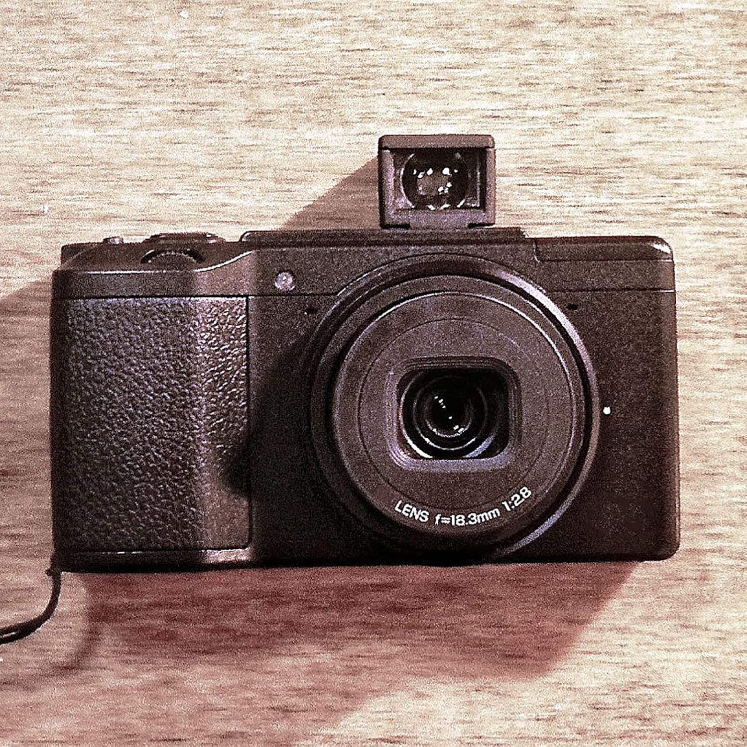 Provides a clean, catalog-style view of the camera product on a neutral background with no distractions, allowing shoppers to see the product clearly.