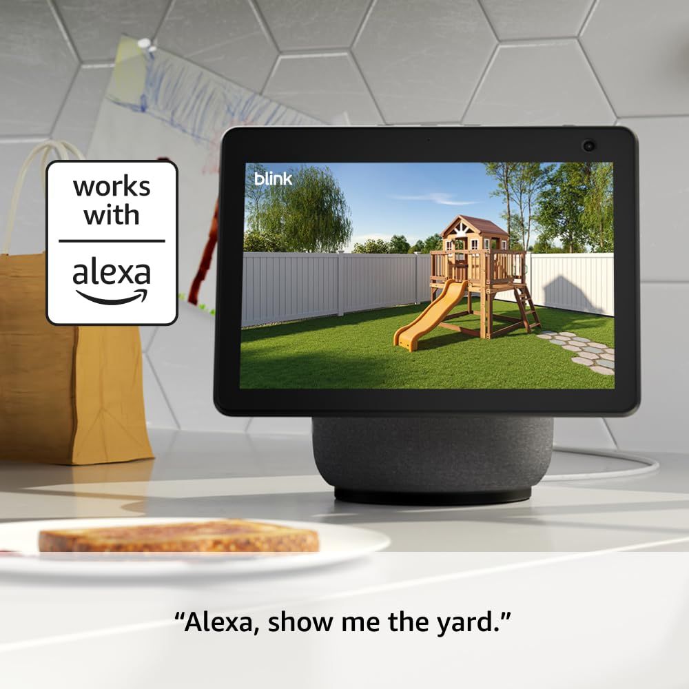 Demonstrates the product's compatibility with Alexa voice assistant, showing how users can view their yard/outdoor camera feed on an Echo Show device through voice commands.